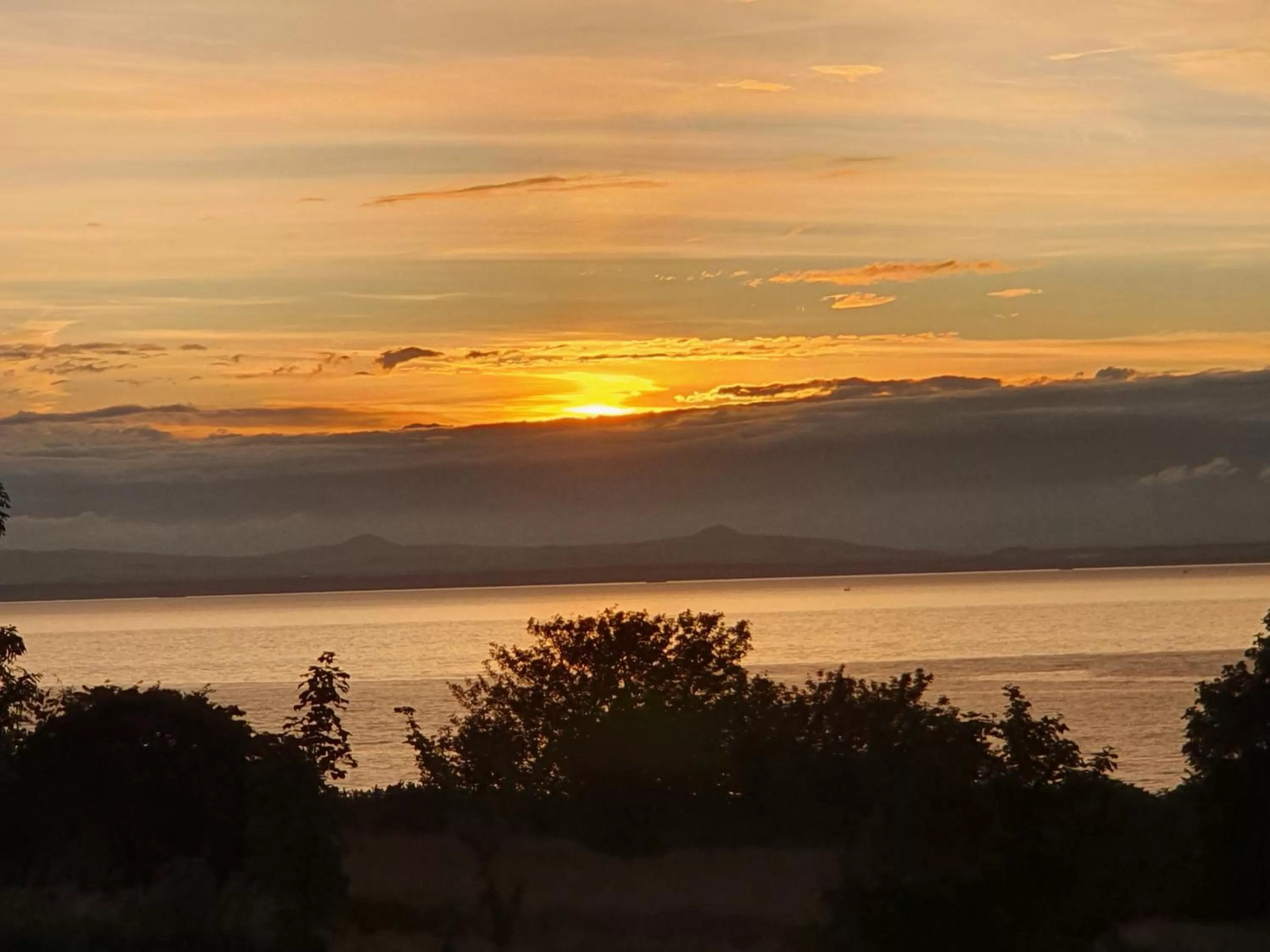 Sunset, Sunrise/Sunset in Maple Cottage B&B