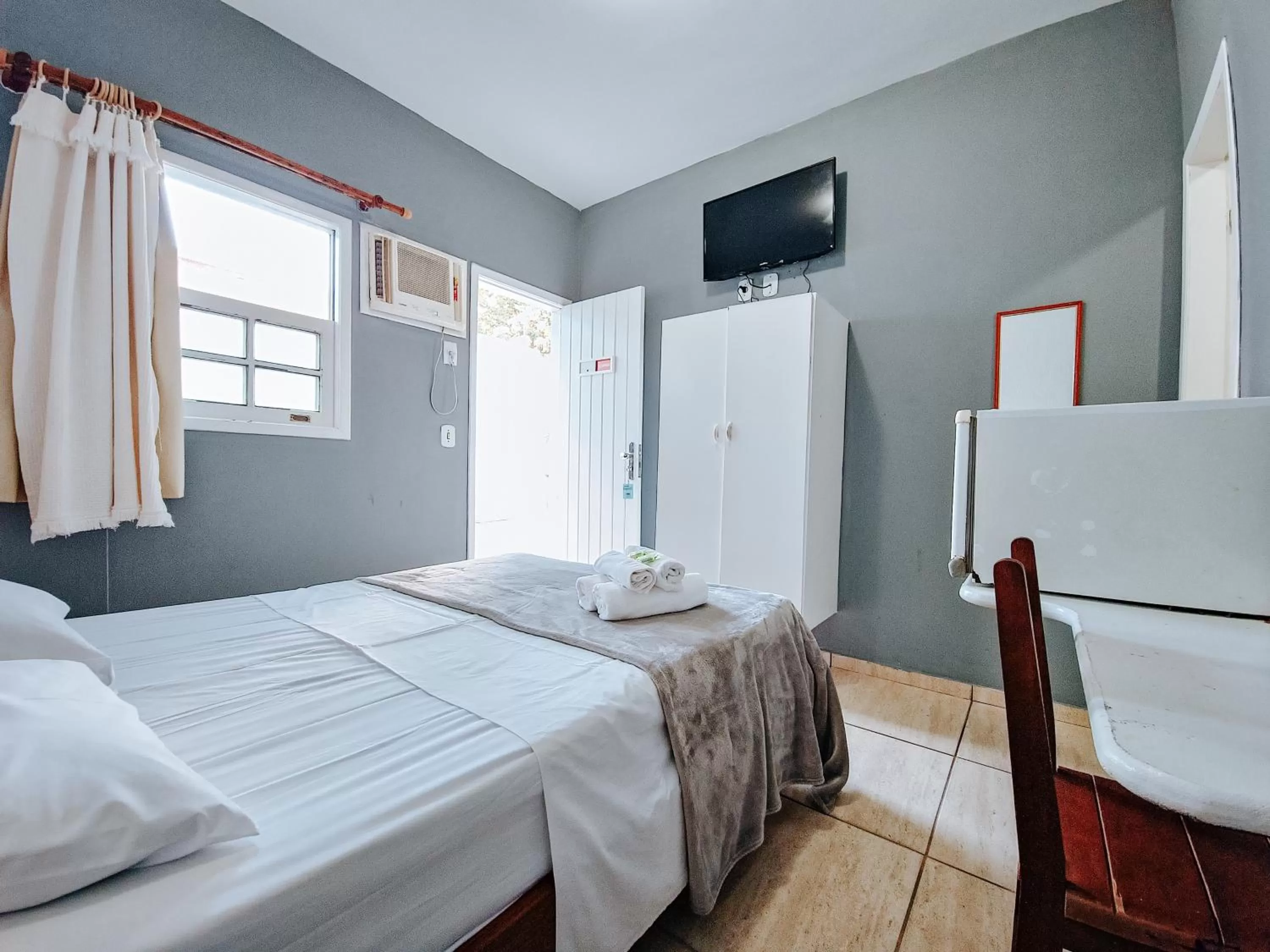 Bed in Pousada Água Marinha