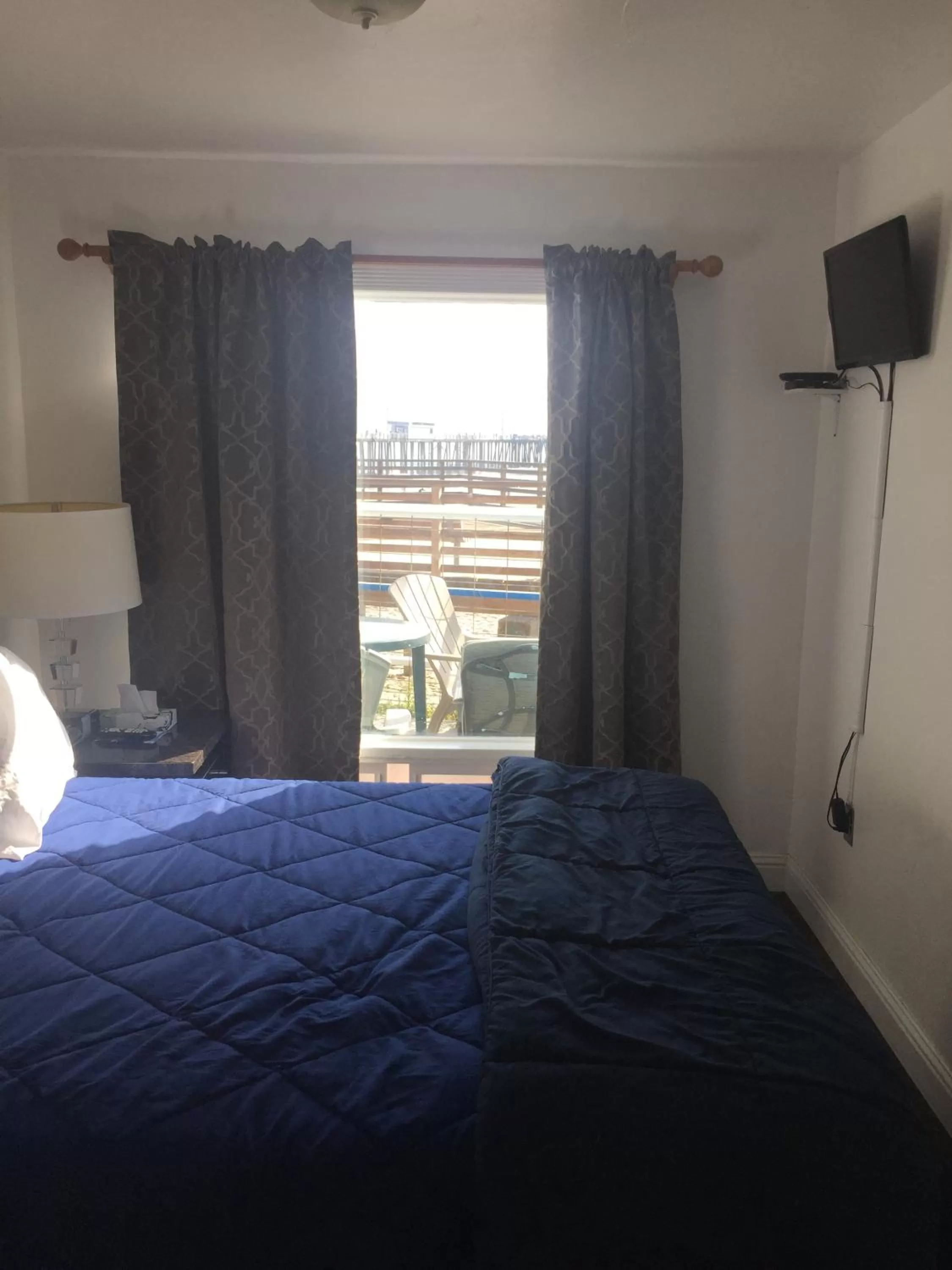 Bed in Dolphin Cove Motel