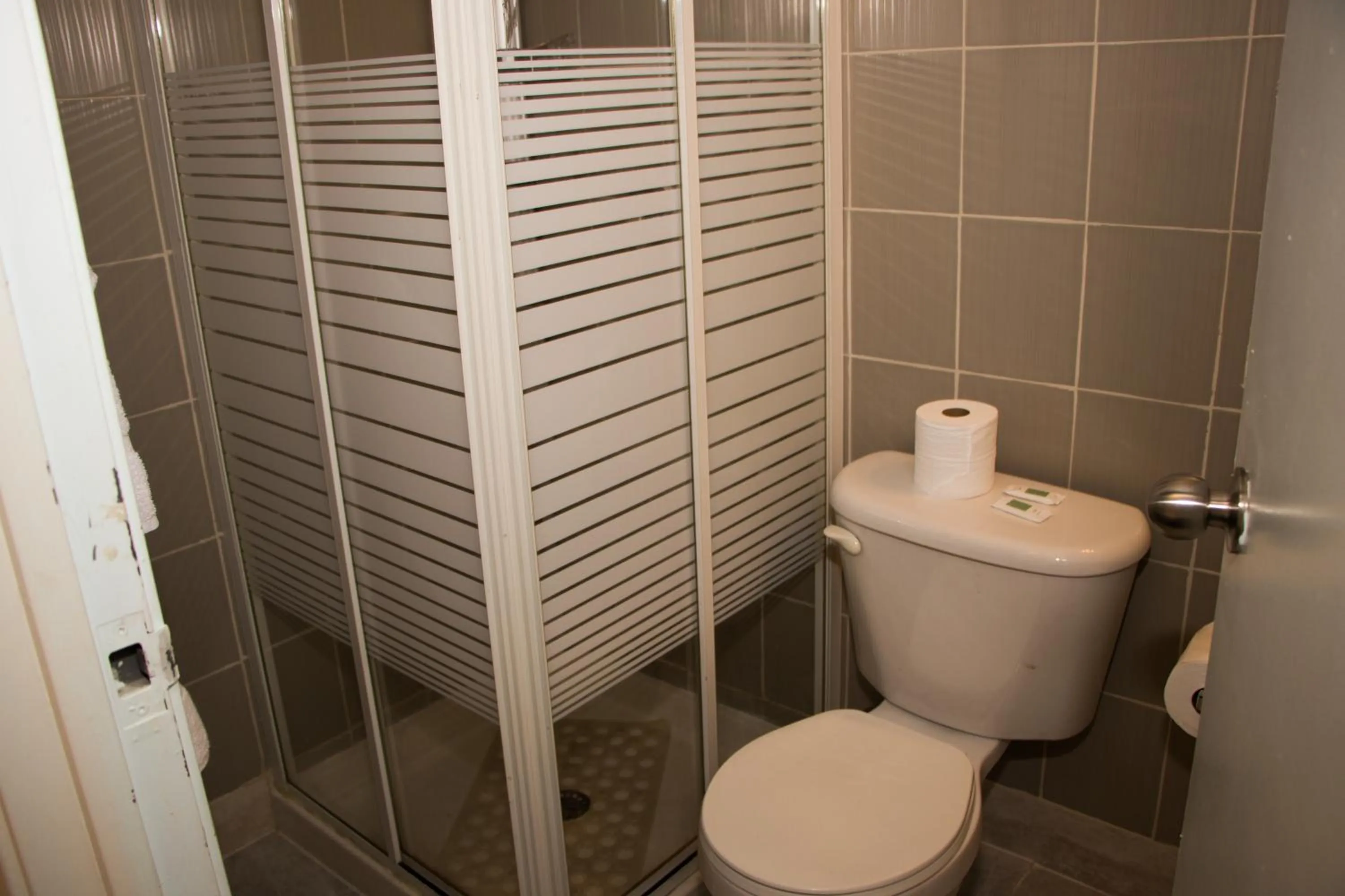 Toilet in Saint Lawrence Residences and Suites