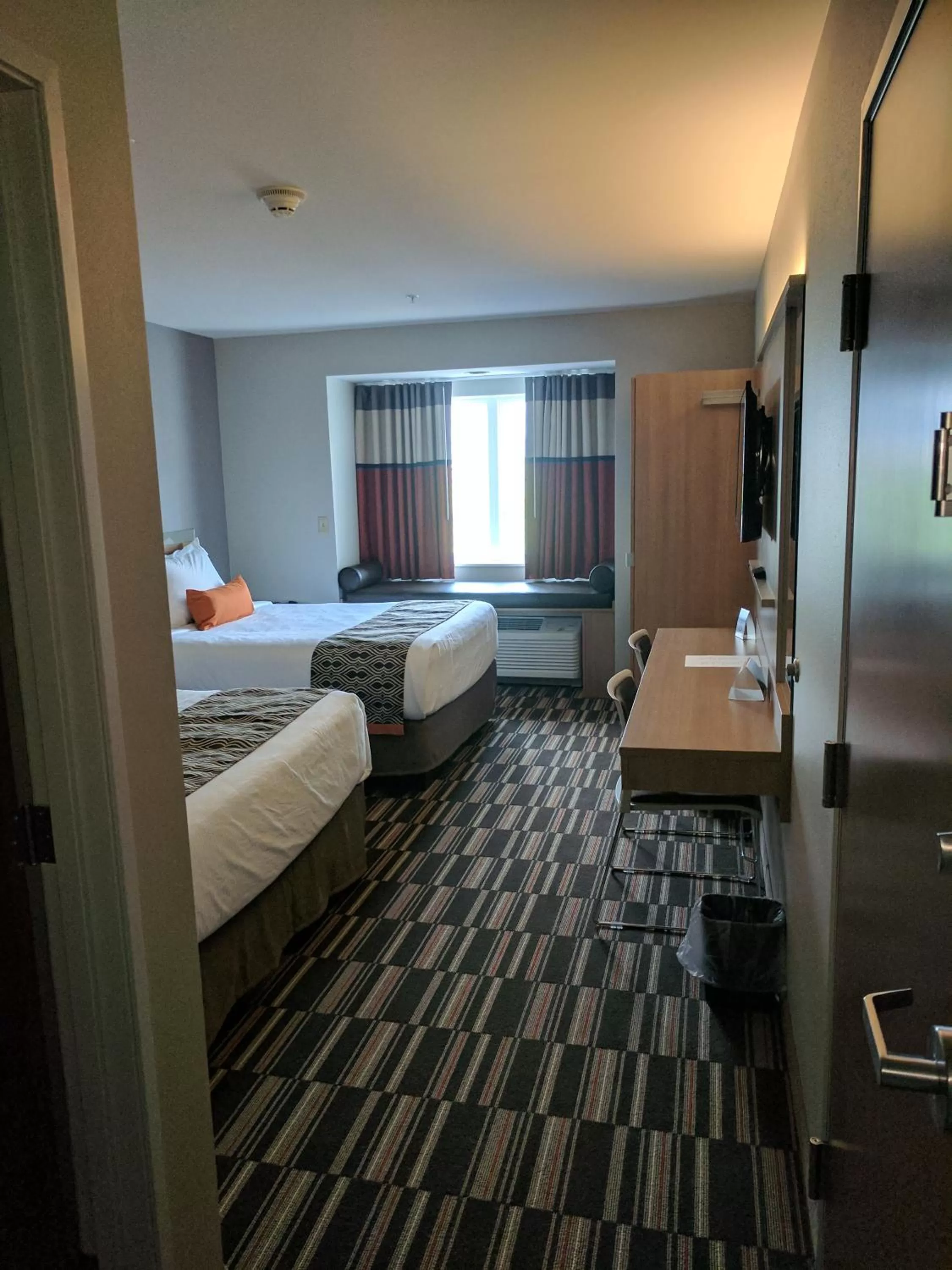 Bed in Microtel Inn & Suites by Wyndham Clarion