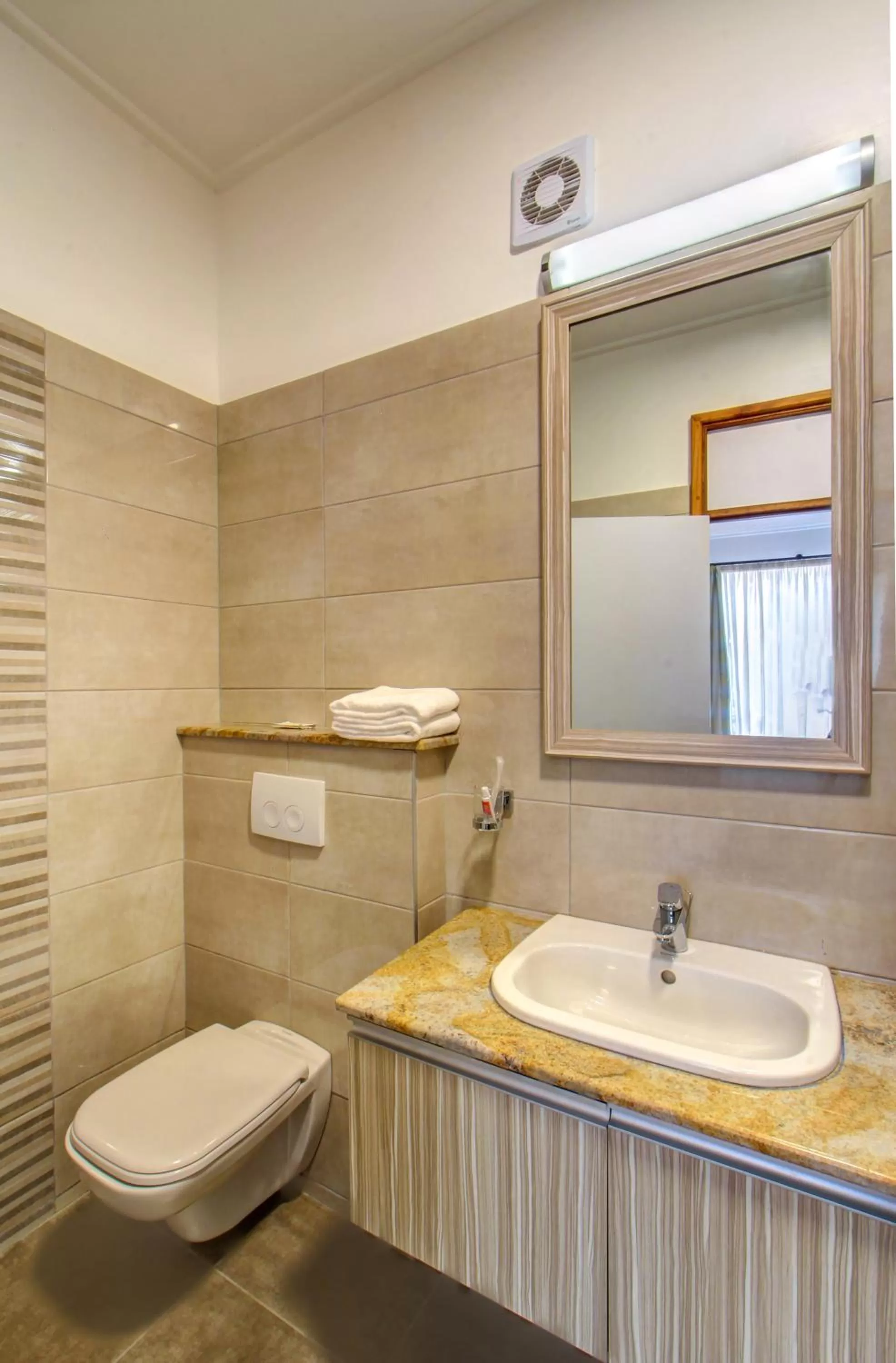 Toilet in Executive Residency by Best Western Nairobi