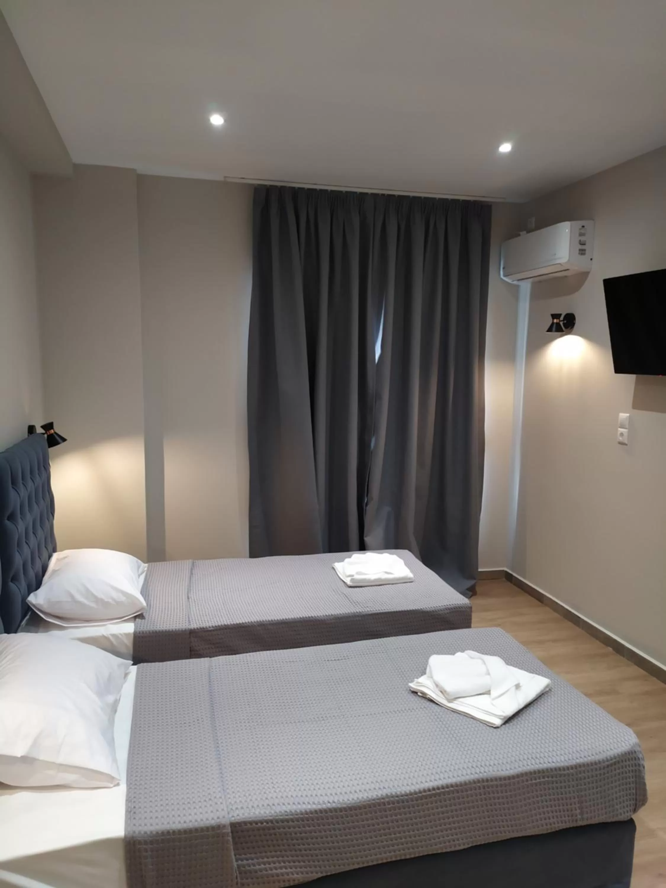 Bed in New Amaryllis Hotel