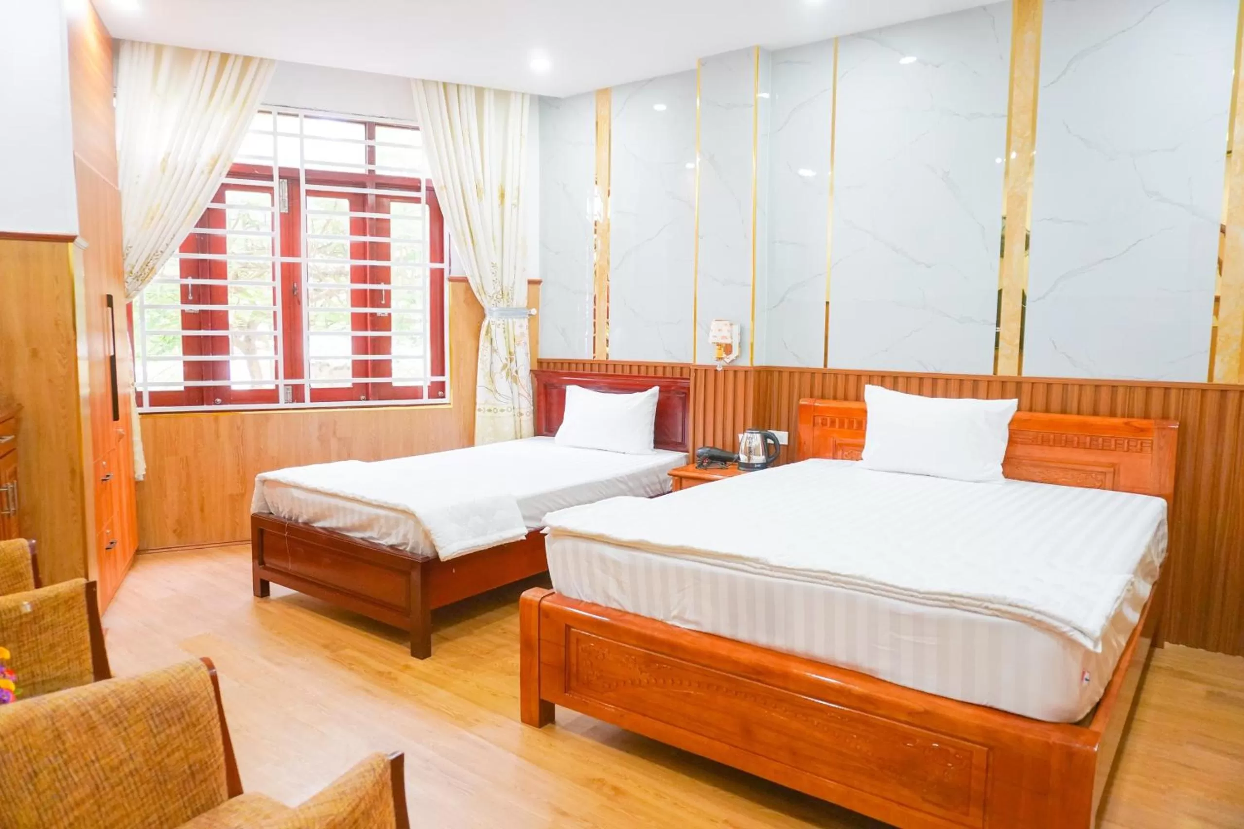 Bed in Nhu Y Hotel