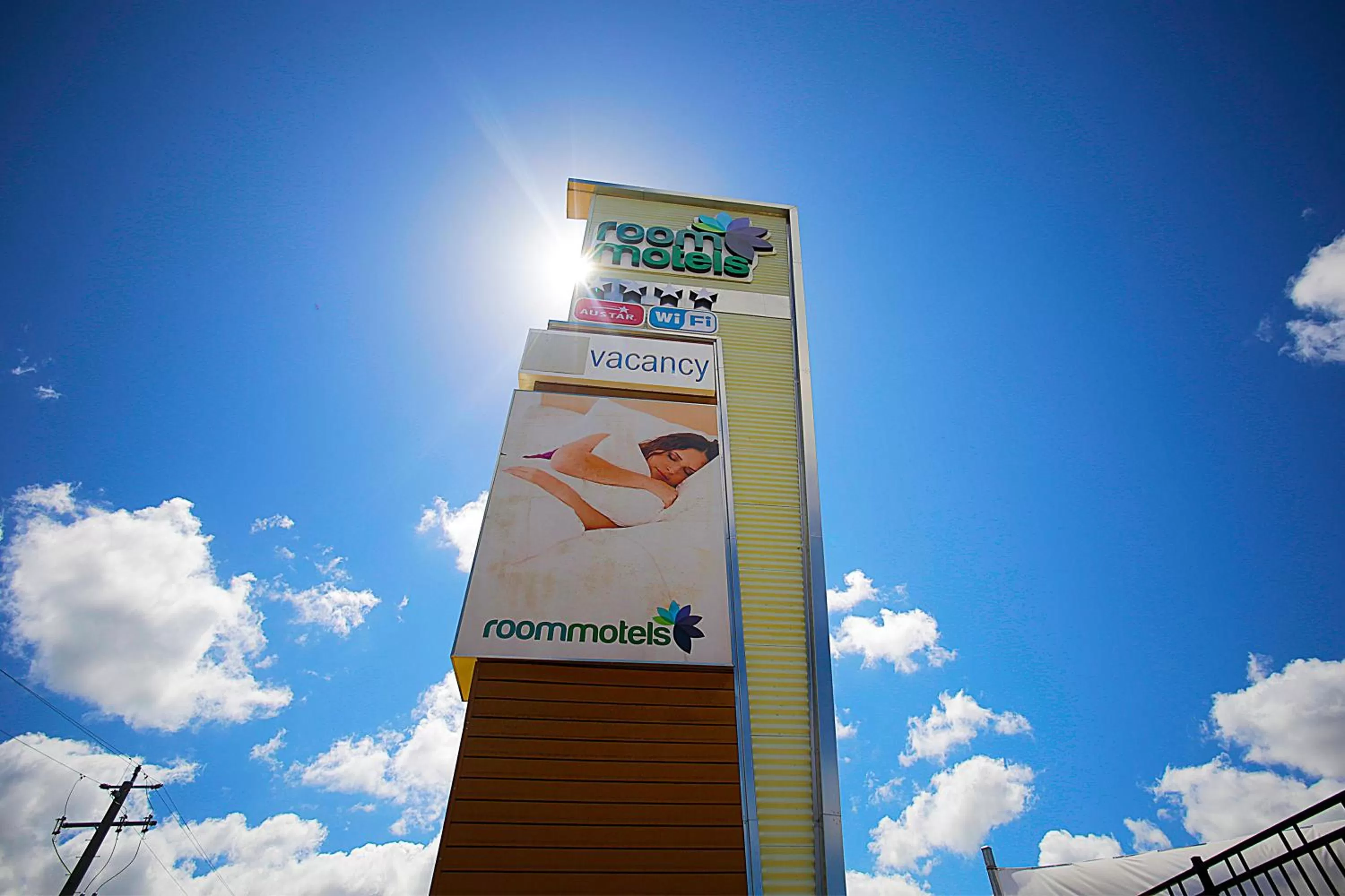 Property logo or sign in Trip Motel Gatton