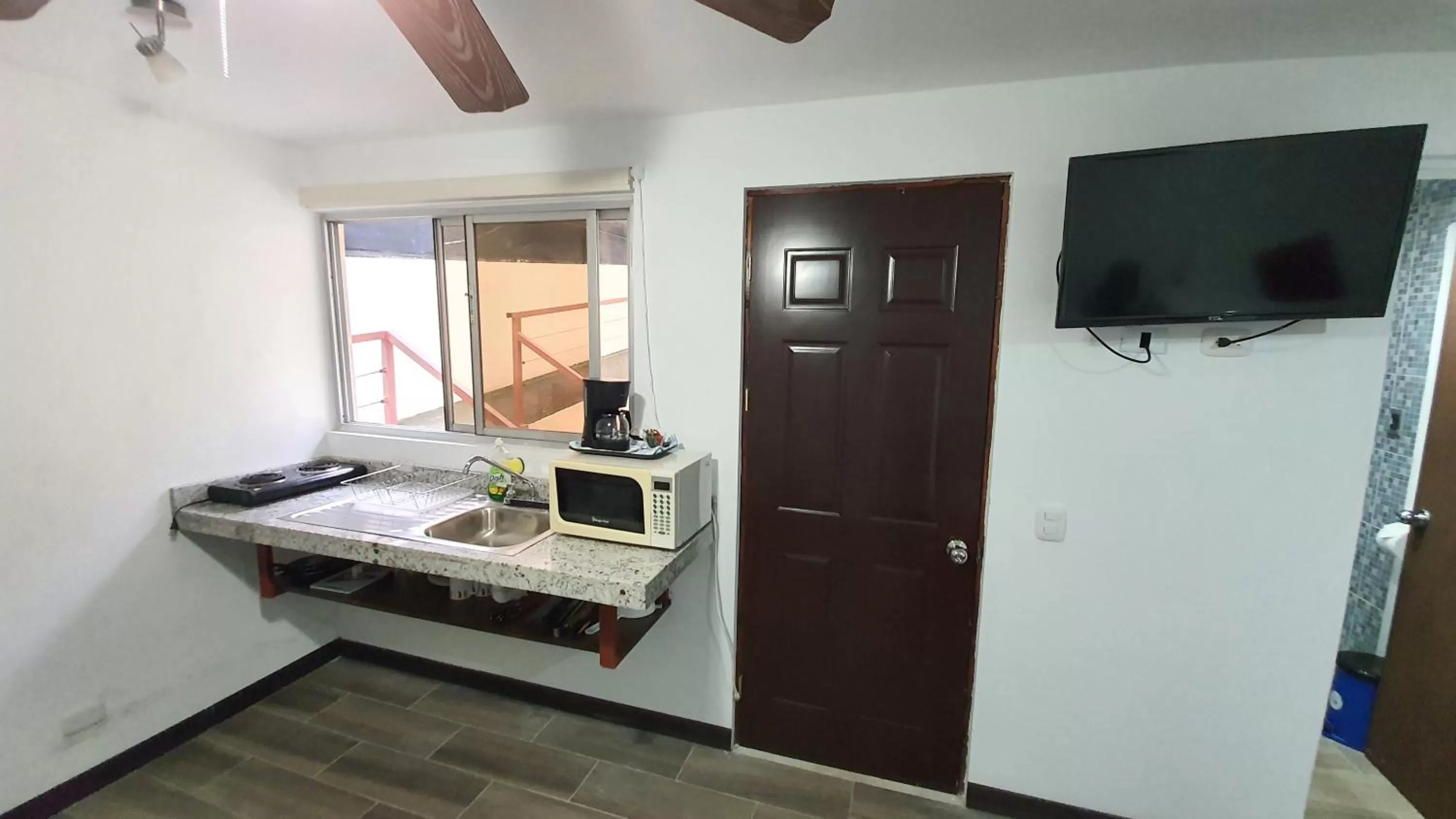 Kitchen or kitchenette in Out of Bounds Boutique Hotel