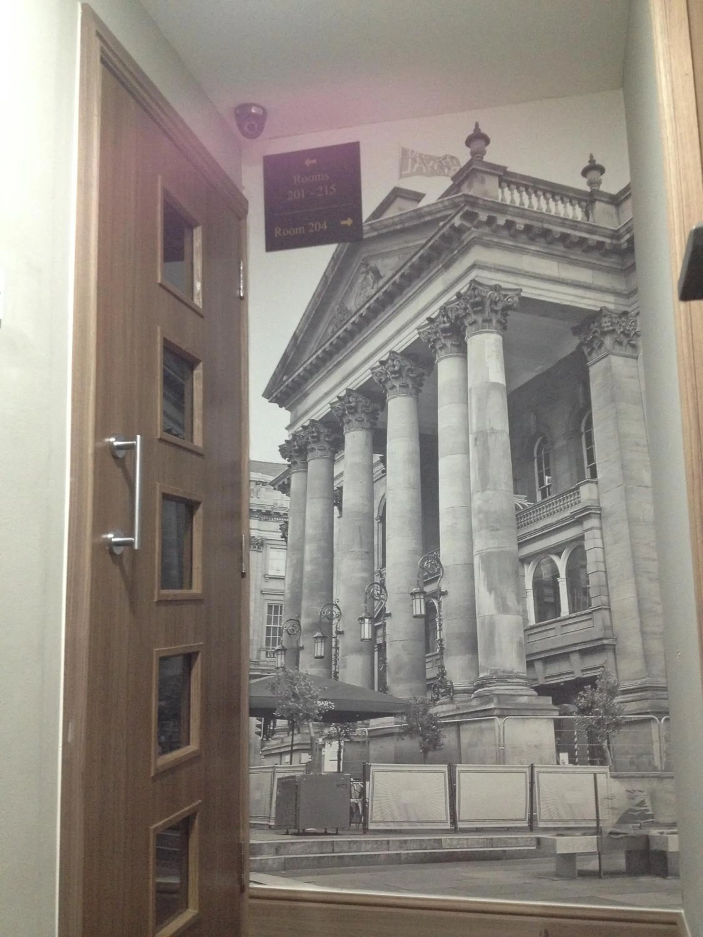 Communal lounge/ TV room in Grainger Hotel