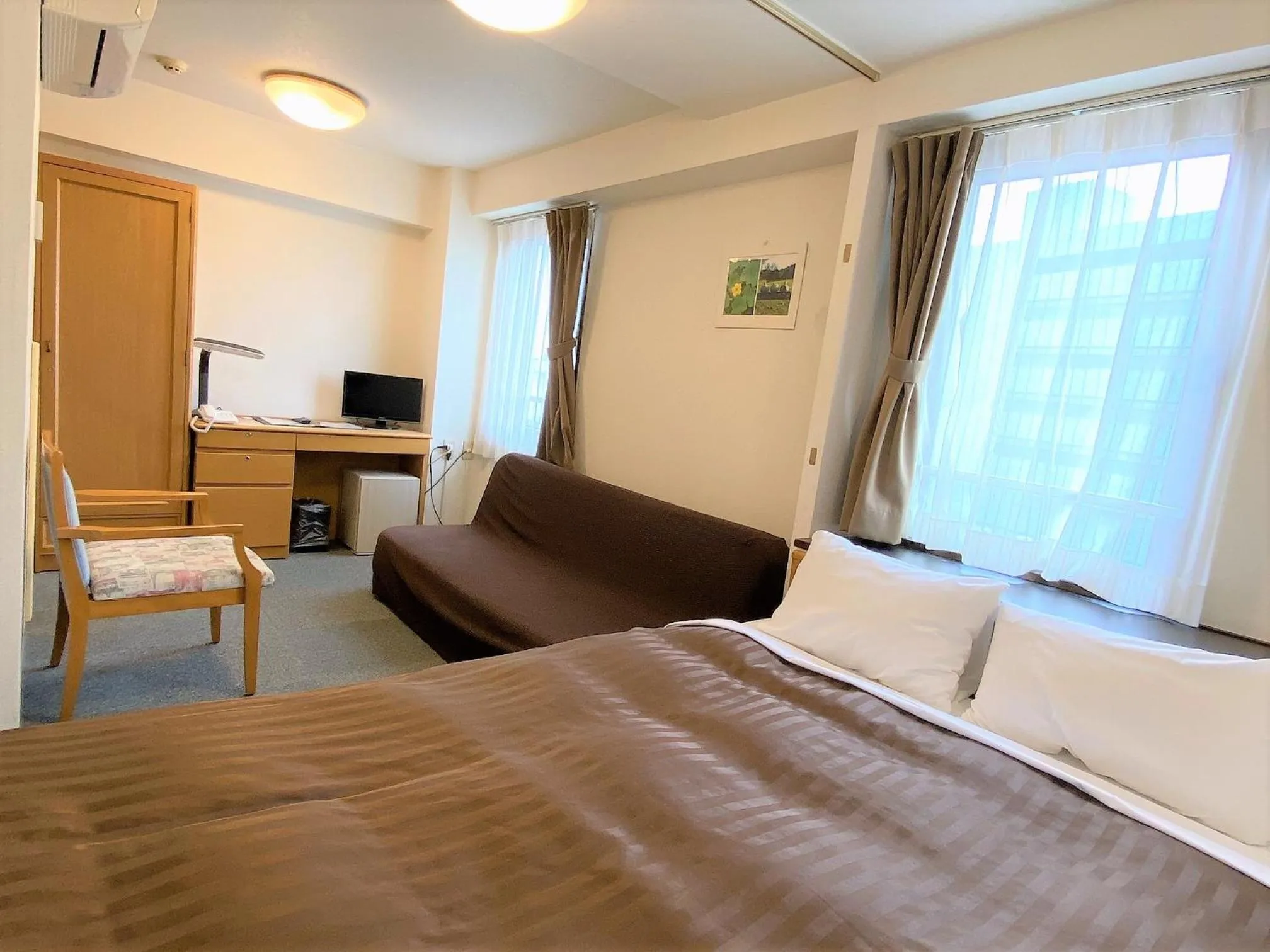 Bed in Sakura Hotel Hatagaya