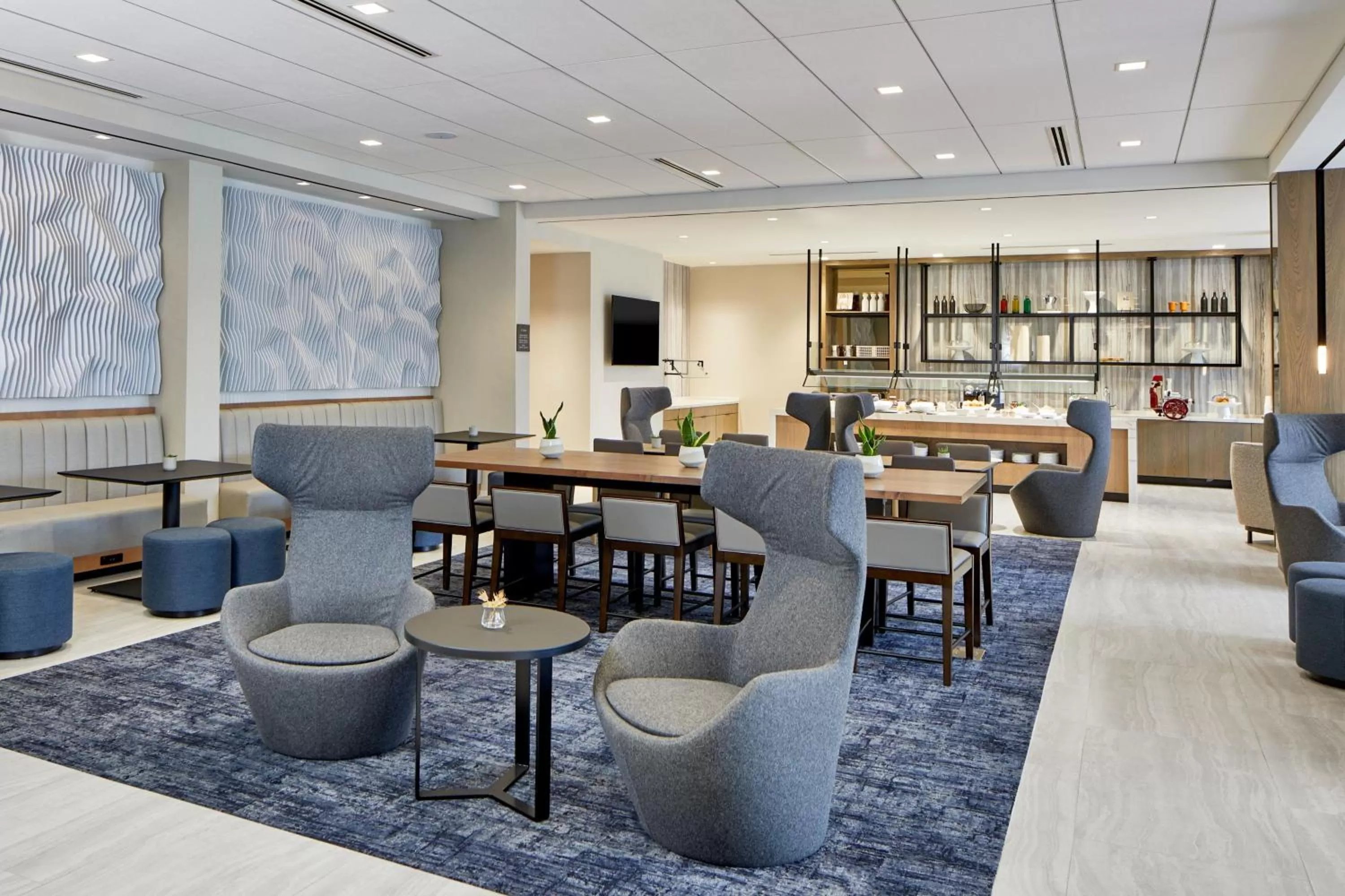 Kitchen or kitchenette in AC Hotel by Marriott Orlando Lake Buena Vista