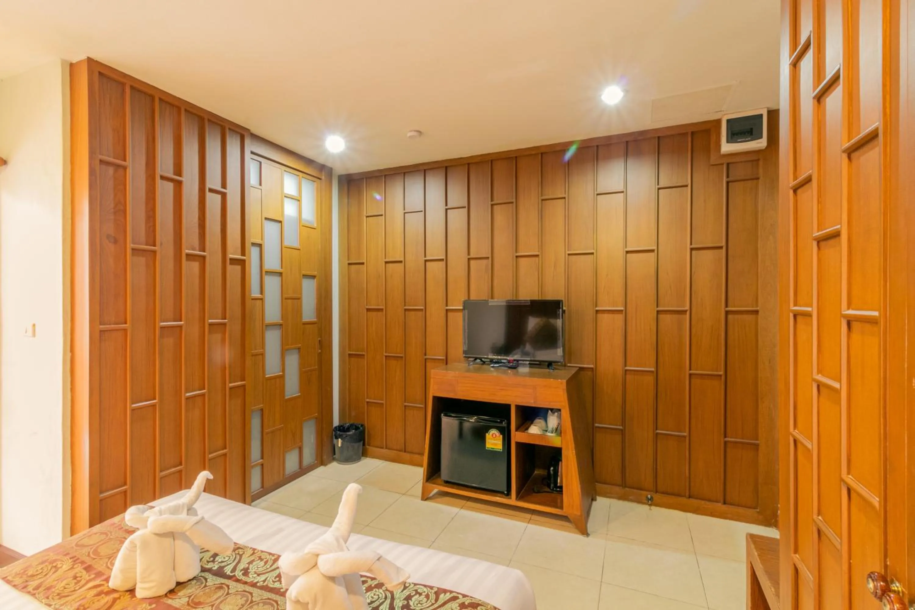 Living room, Bed in Lotus Hotel Patong