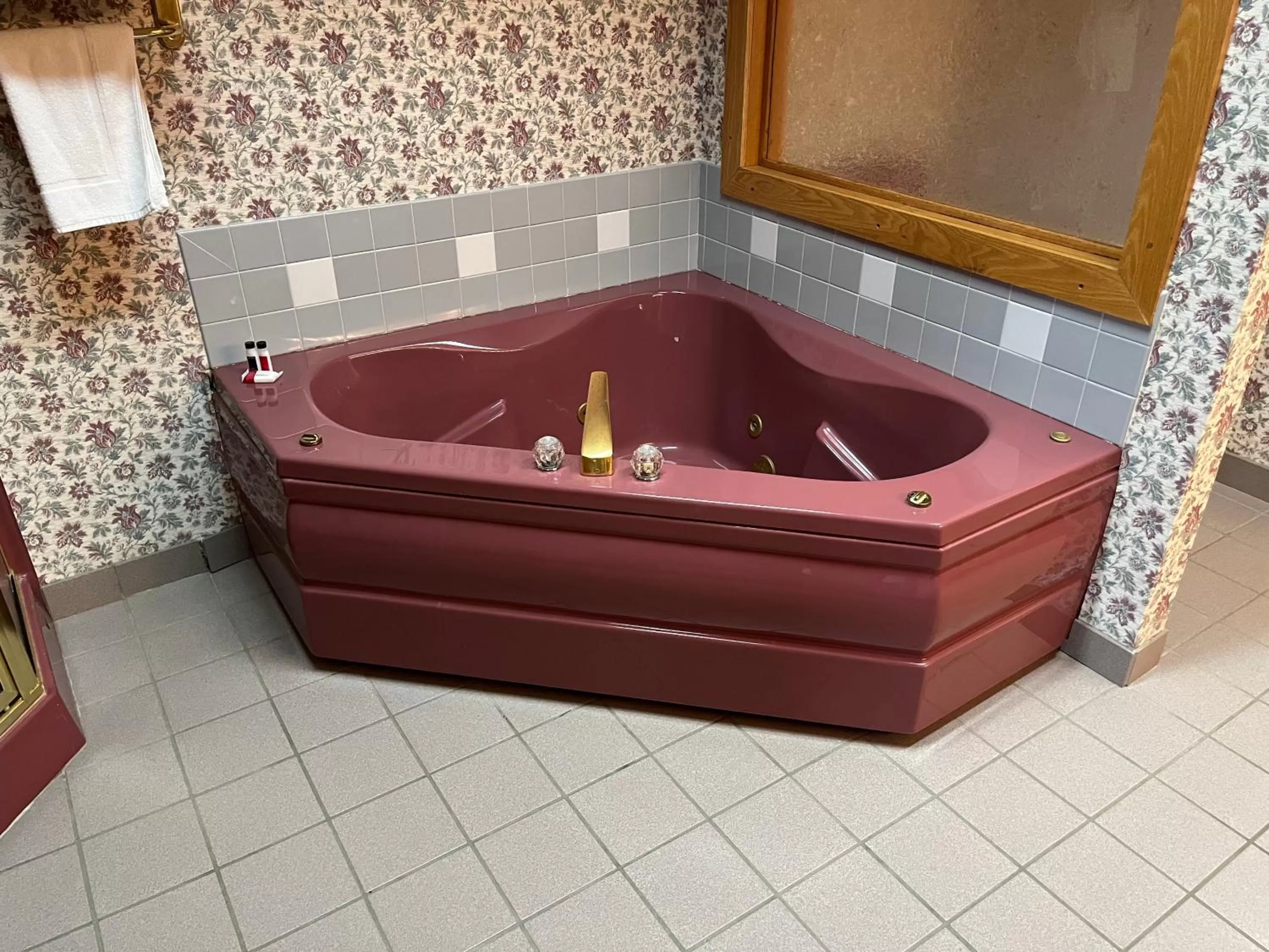 Bathroom in Days Inn & Suites by Wyndham Sutton Flatwoods