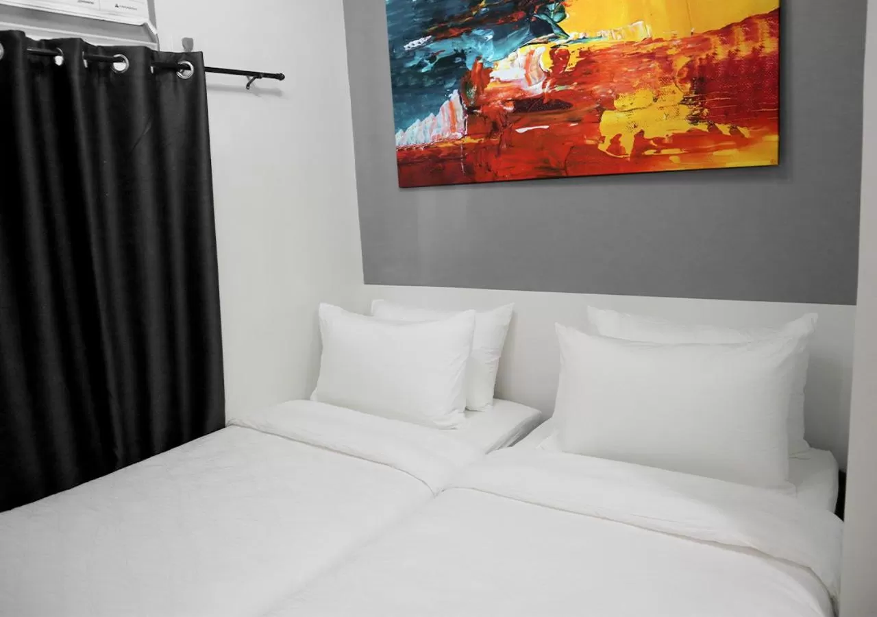 Bed in mySTAY Hotel BGC South