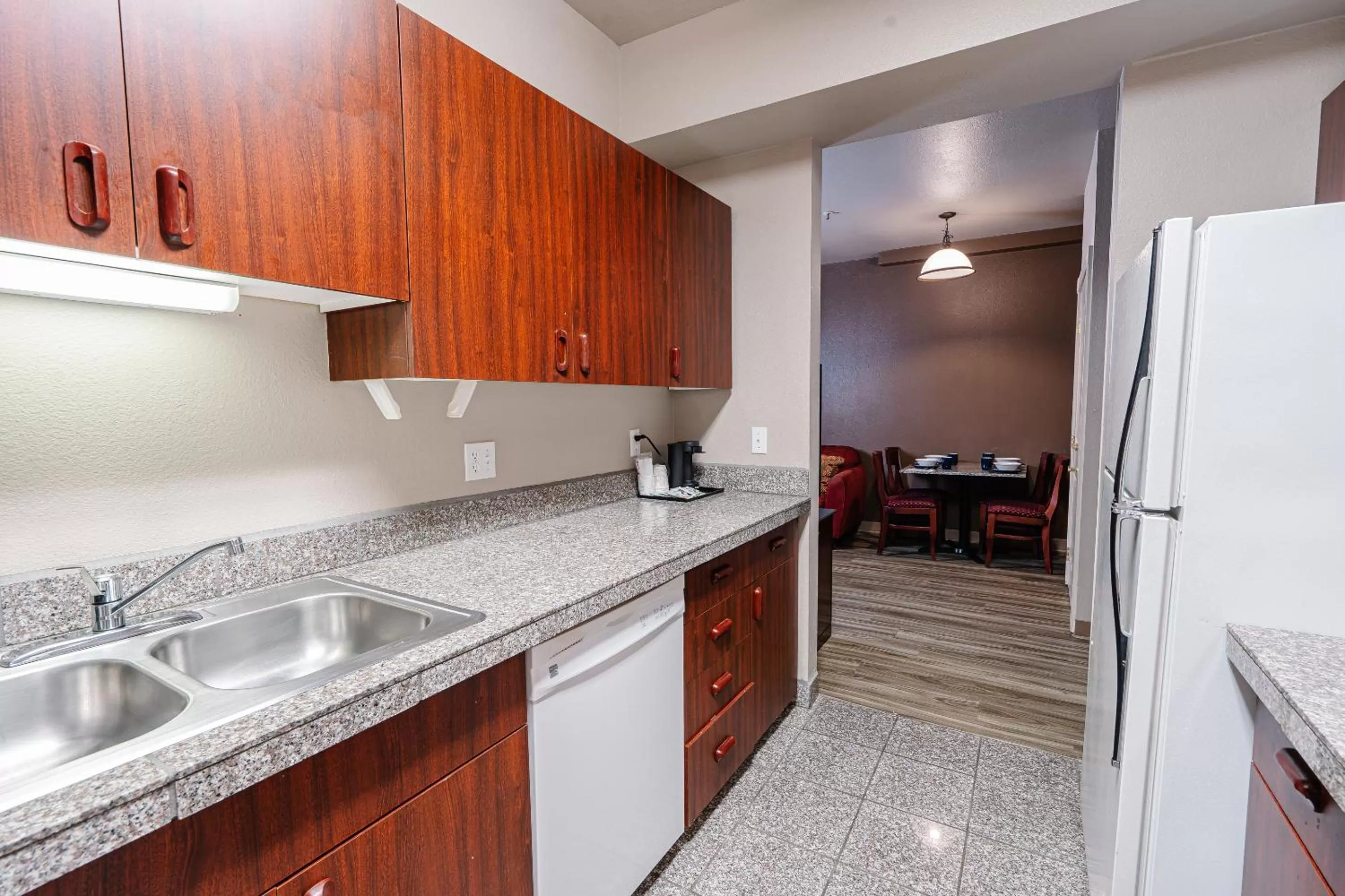 Kitchen or kitchenette in The Ashley Inn & Suites