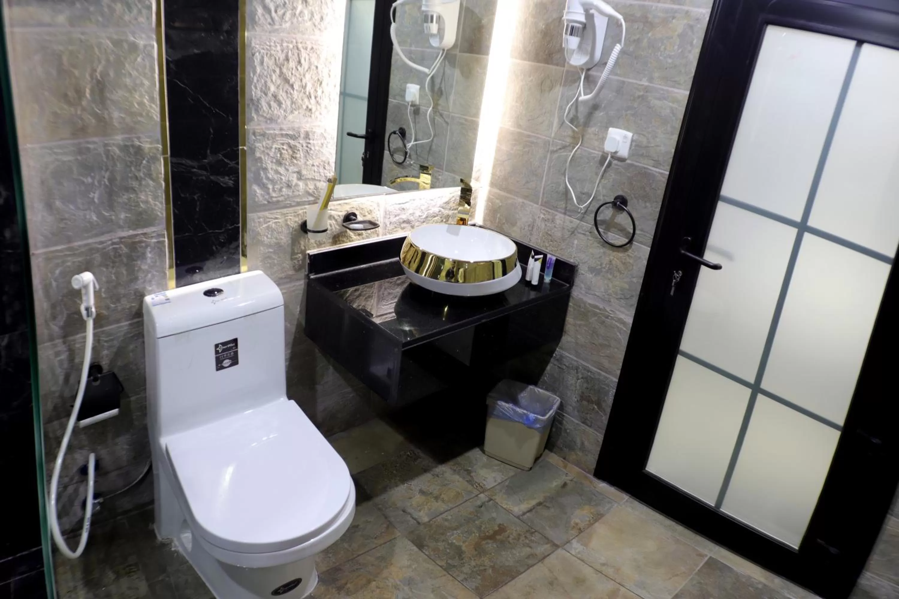 Bathroom in Maskan Al Dyafah Hotel Apartments