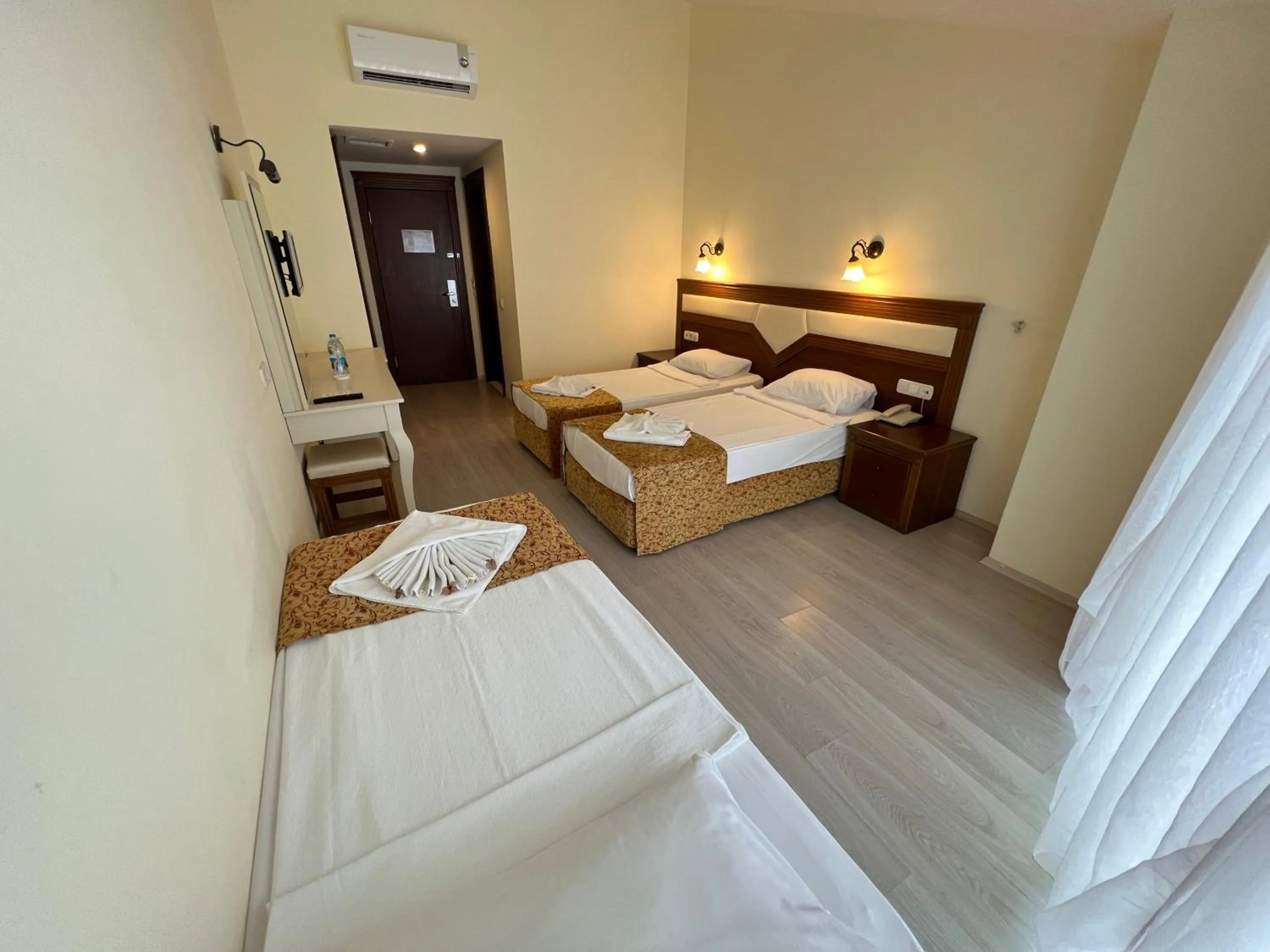 Bed in Valeri Beach Hotel