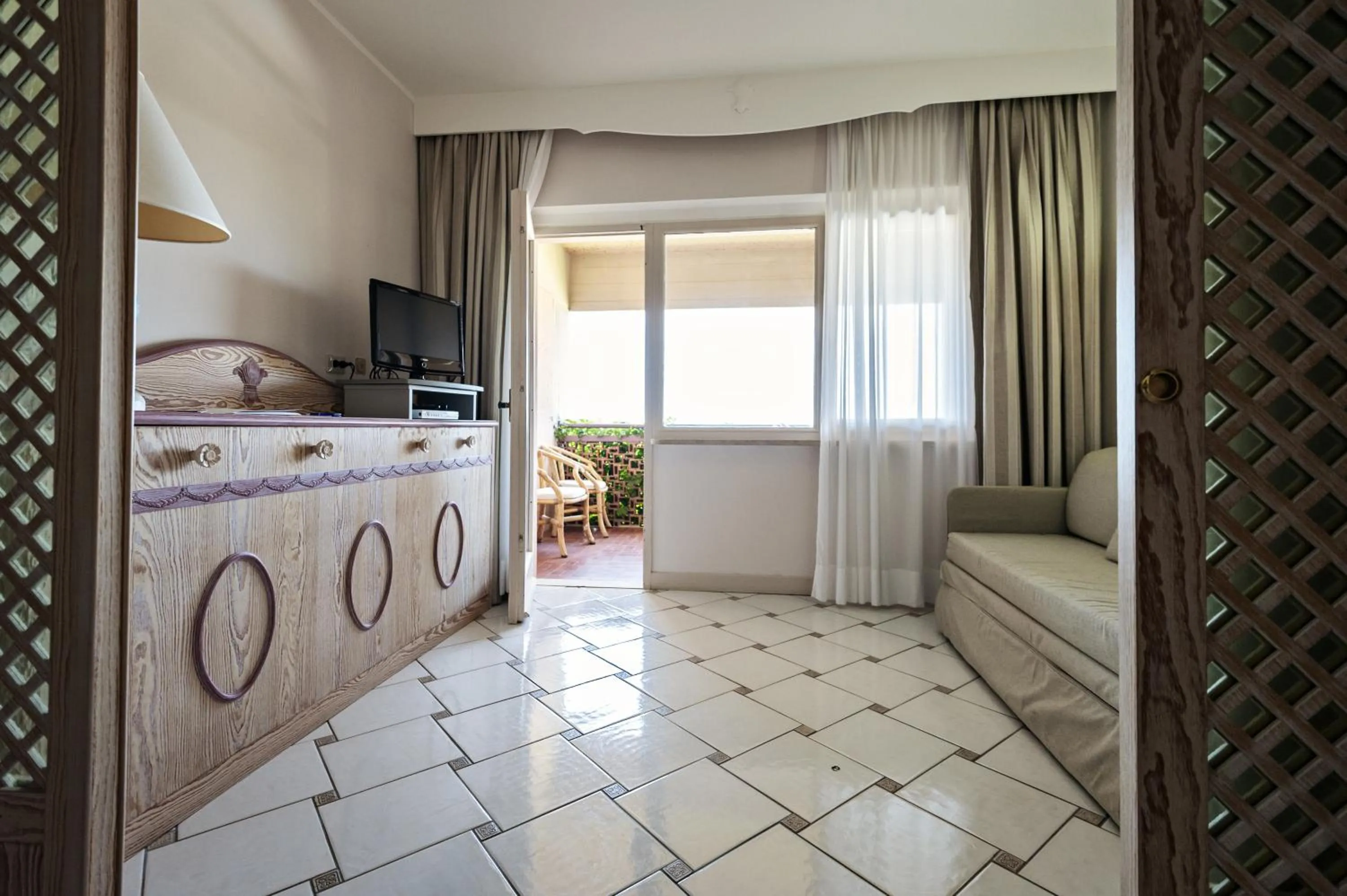 Day, Bed in Golf Hotel Punta Ala