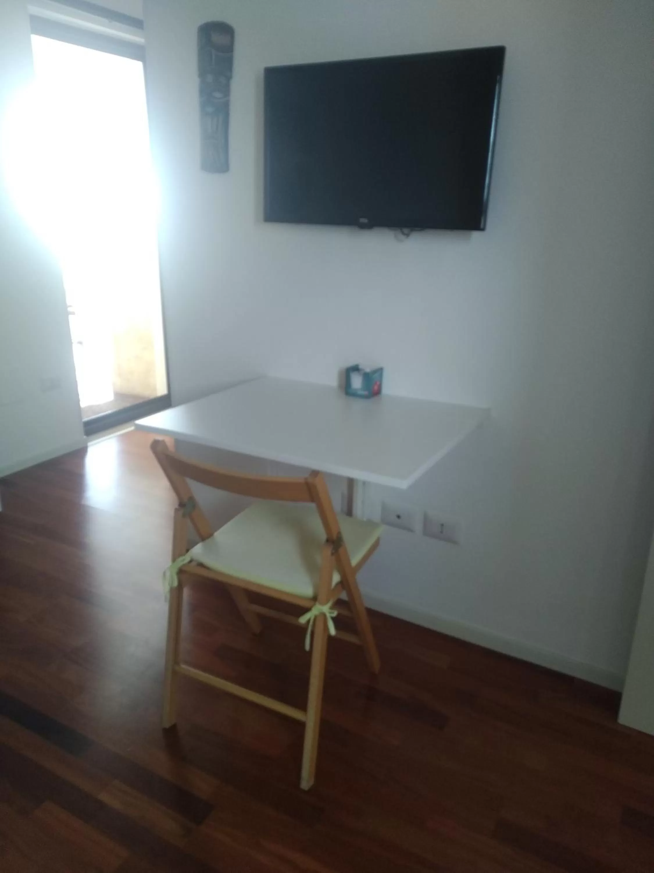 Seating area, TV/Entertainment Center in Dimora Dioniso