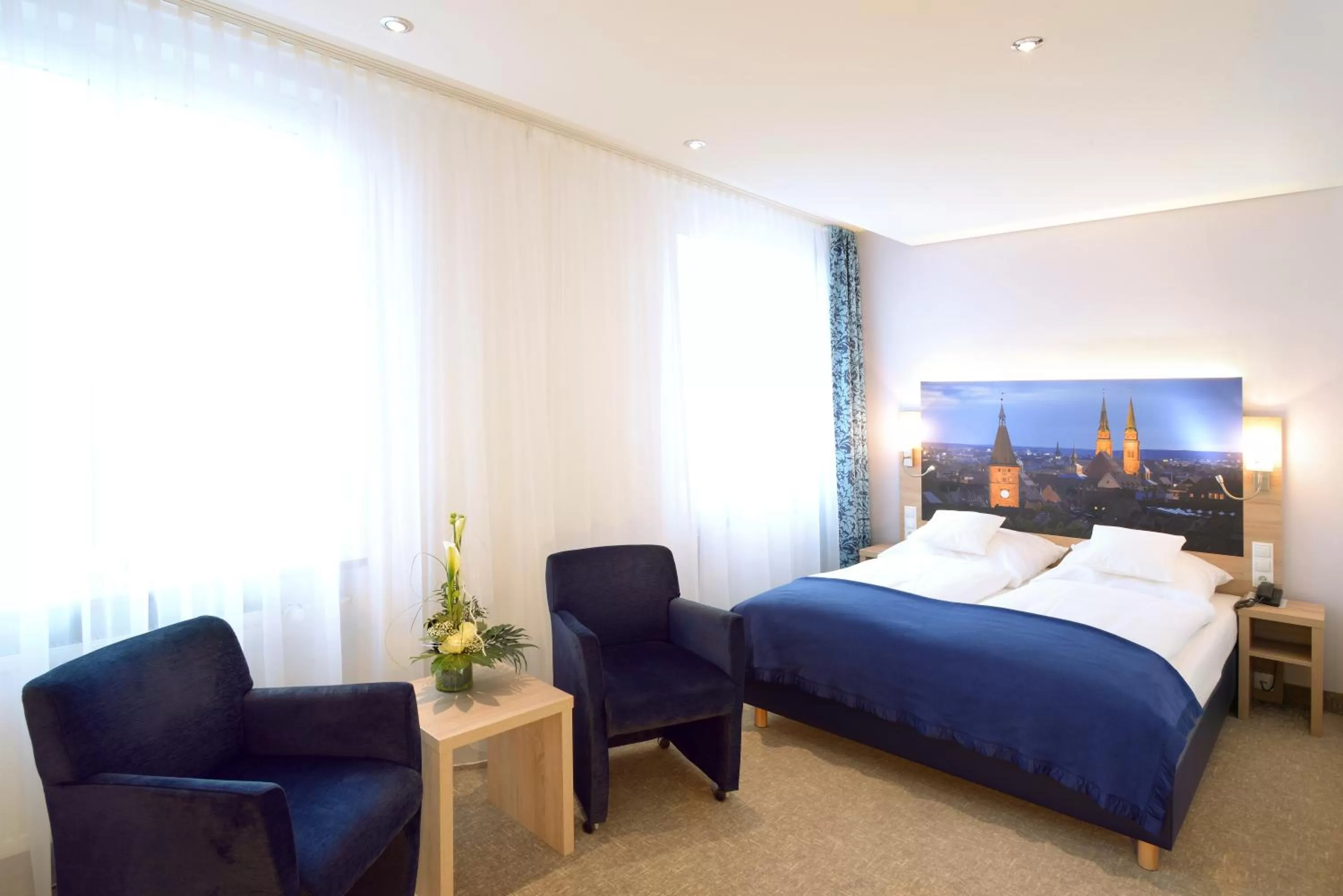 Photo of the whole room, Bed in Ringhotel Loew's Merkur