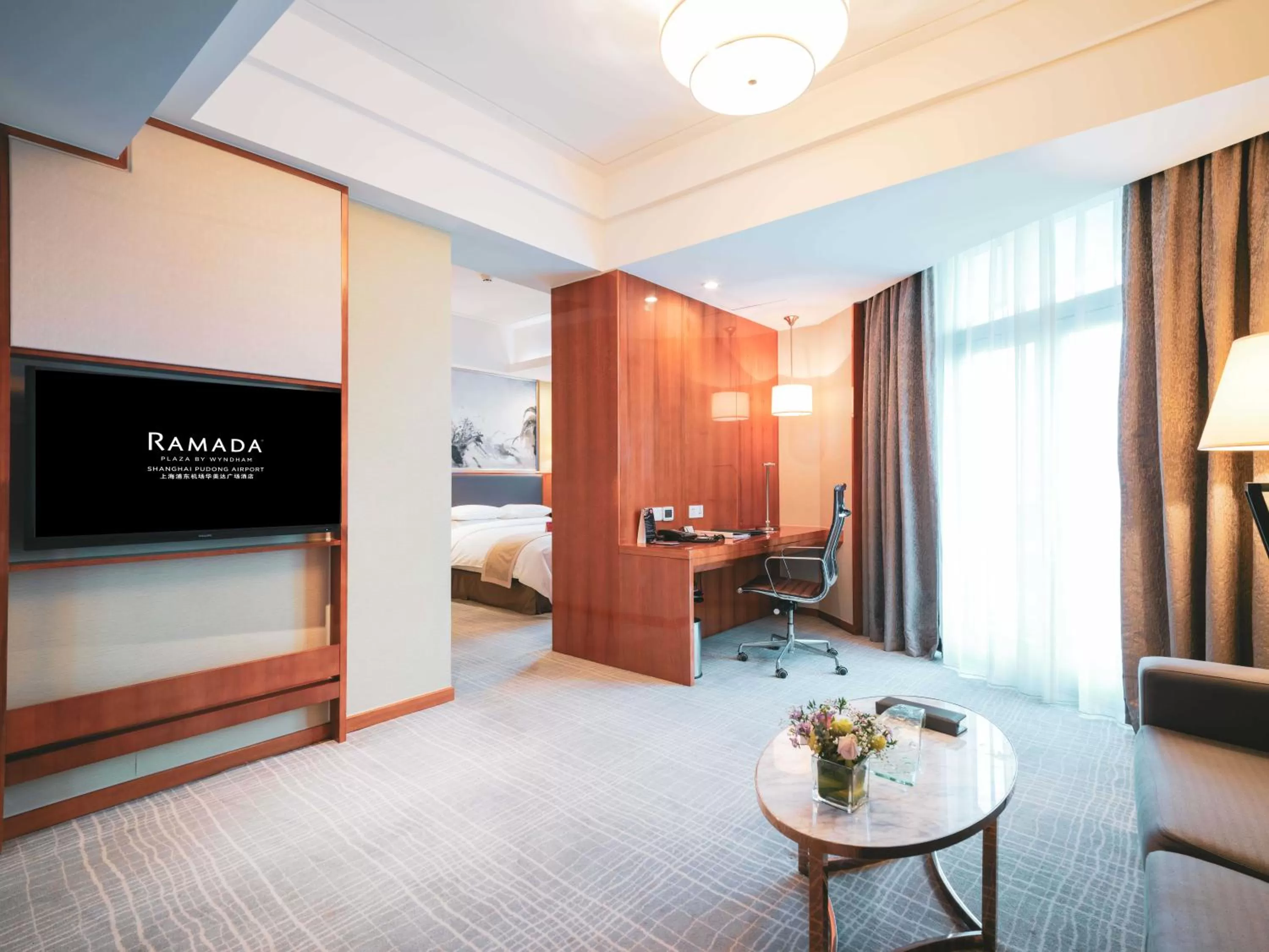 Living room, Bed in Ramada Plaza Shanghai Pudong Airport - 3 mins to PVG depature floor & check entrance with hotel shuttle