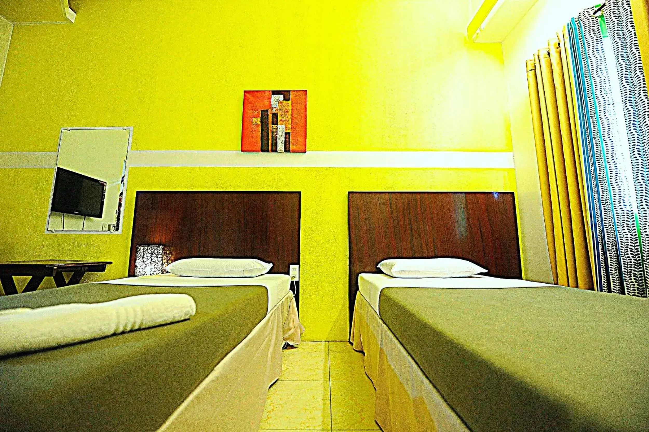Twin Room in First Pacific Inn Davao Twin Room in First Pacific Inn Davao