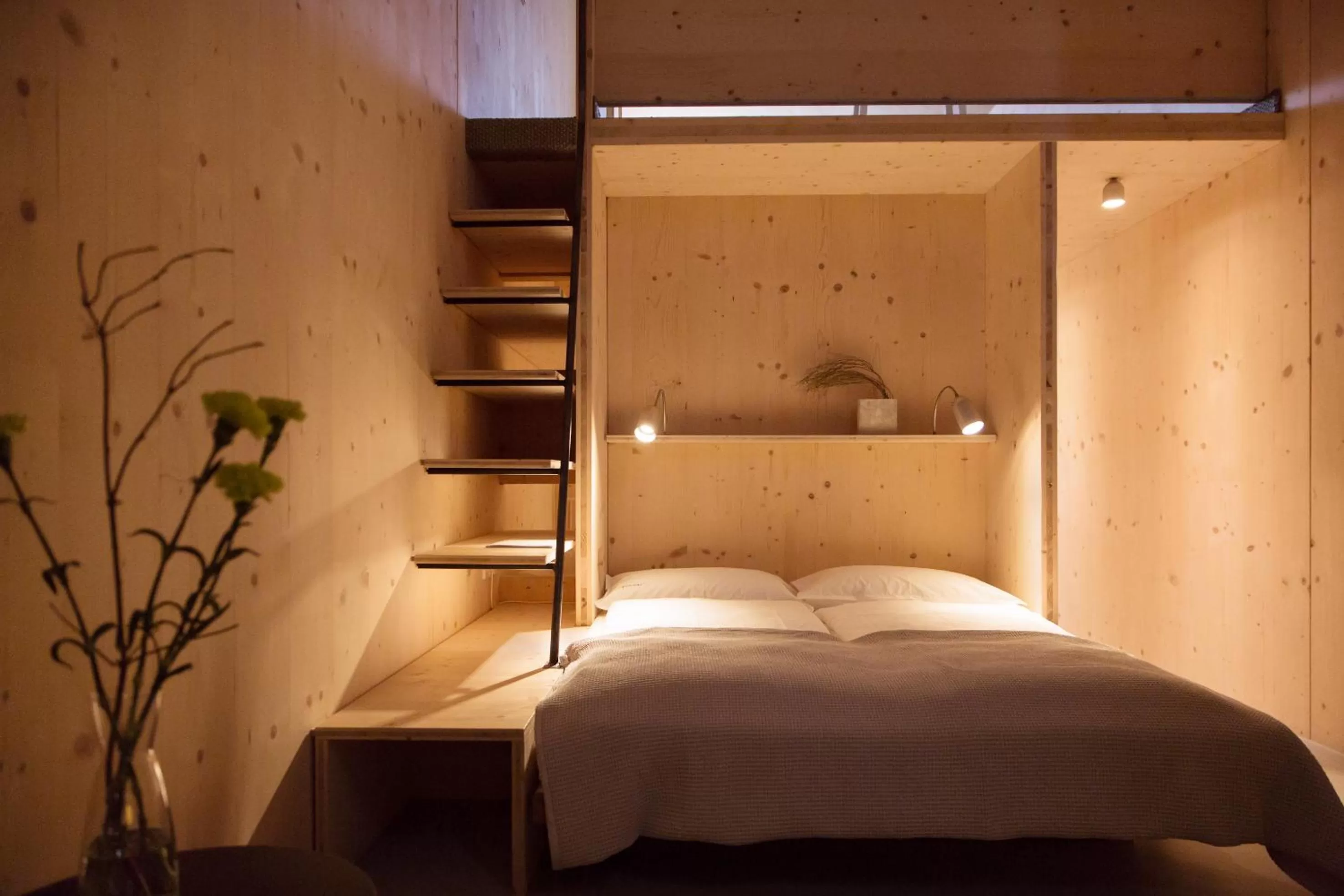 Bed in quartier - über Nacht in besonderer Architektur