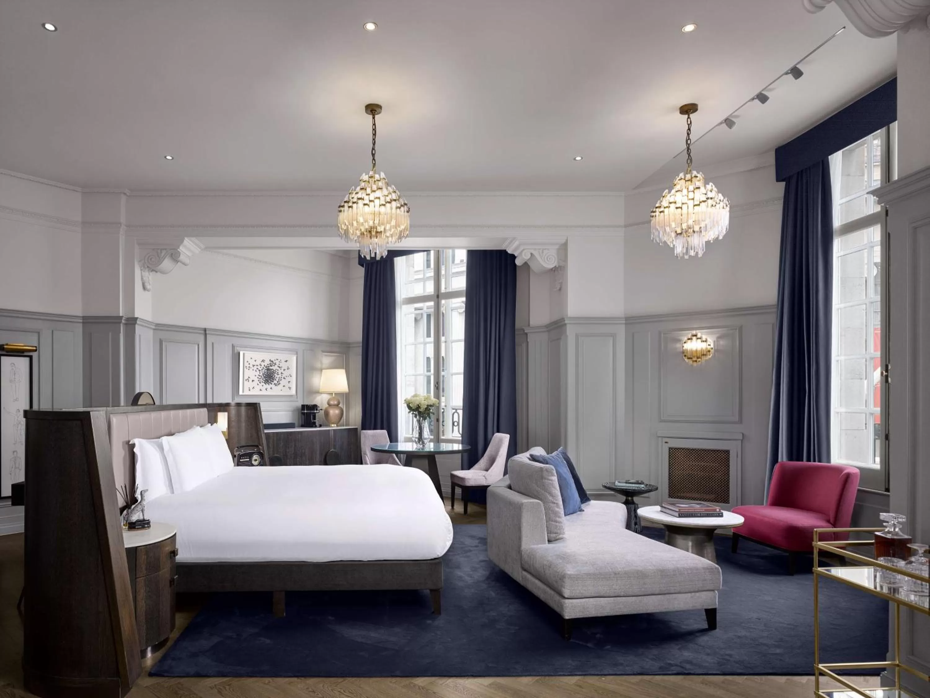 Living room, Bed in The Trafalgar St. James, London Curio collection by Hilton