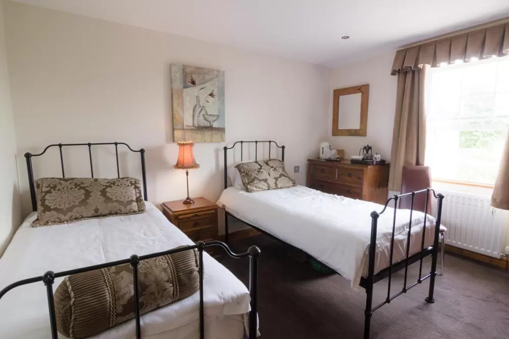 Bed in The Red Pump Inn