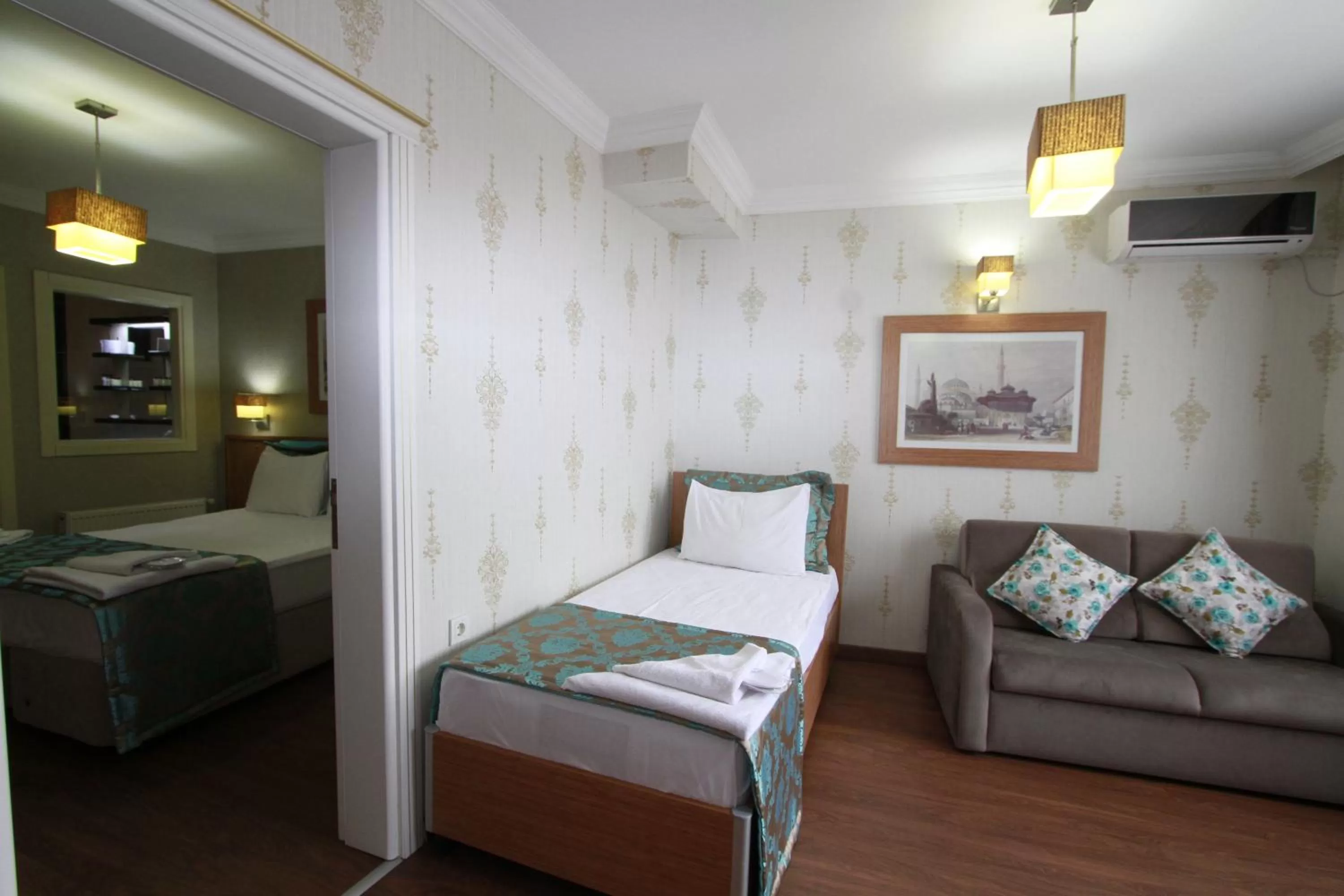 Living room, Bed in Agora Boutique Hotel & Bistro