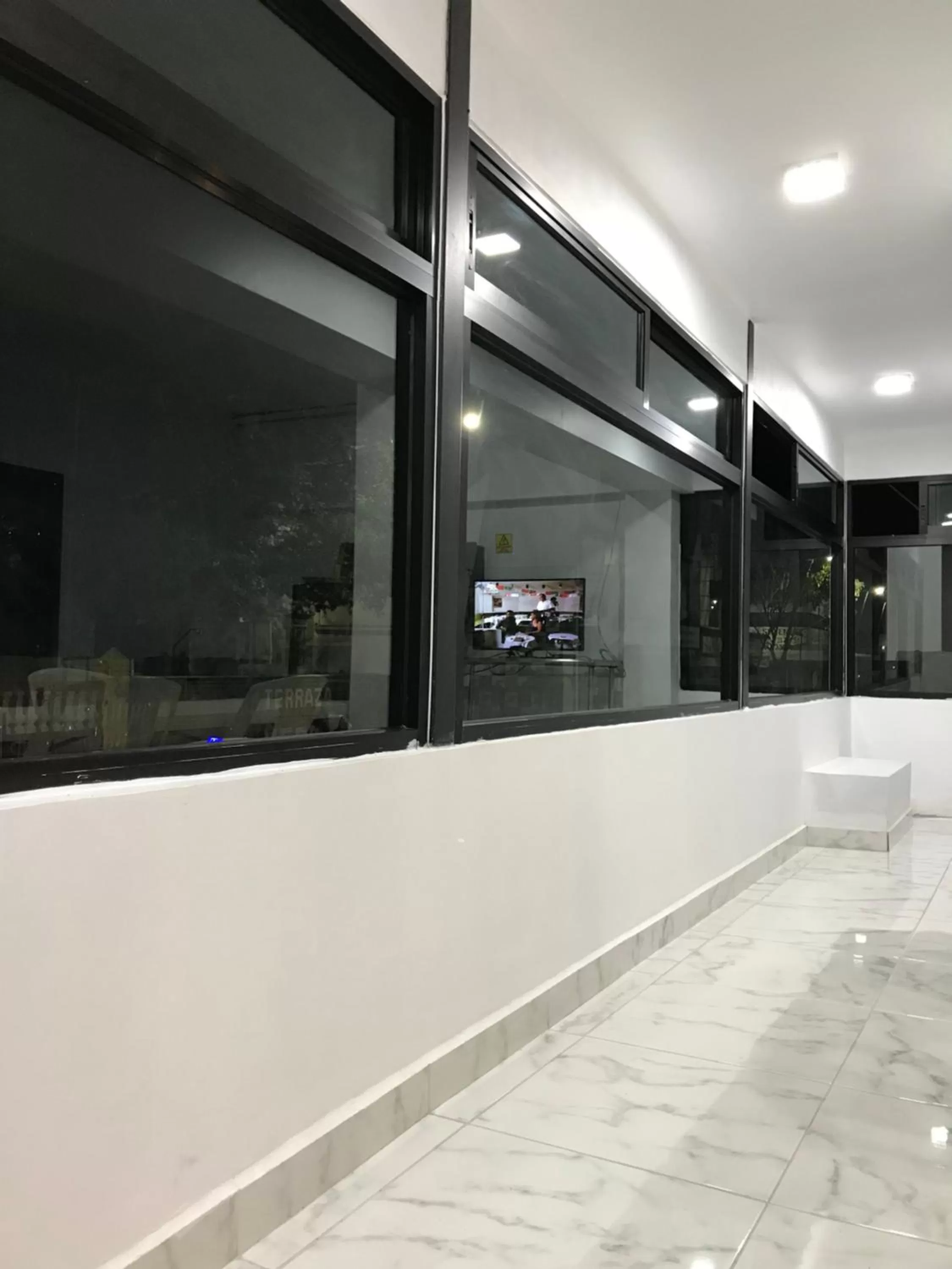 Communal lounge/ TV room in Hotel Plaza Amalia