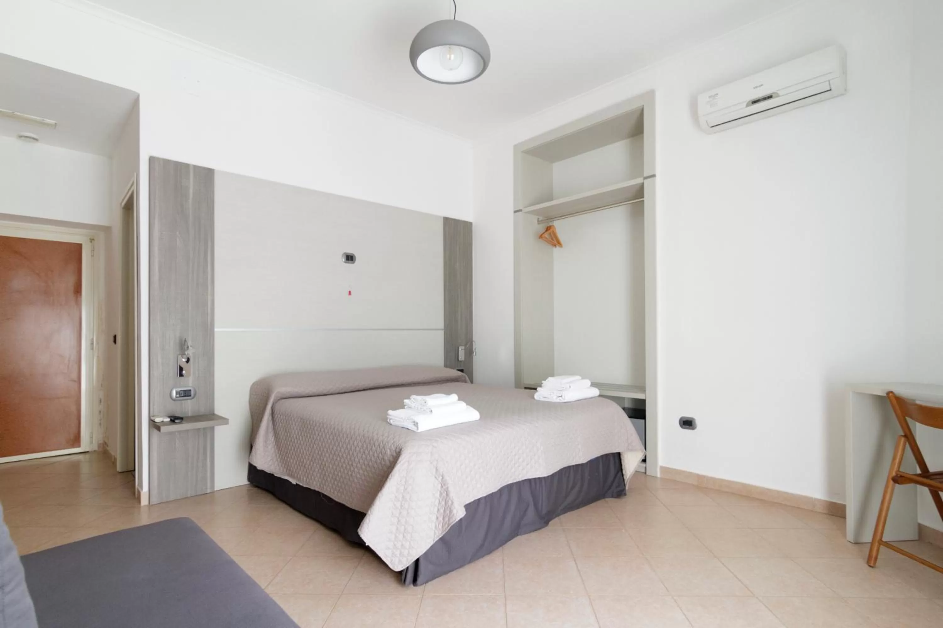 Bed in San Marco Hotel