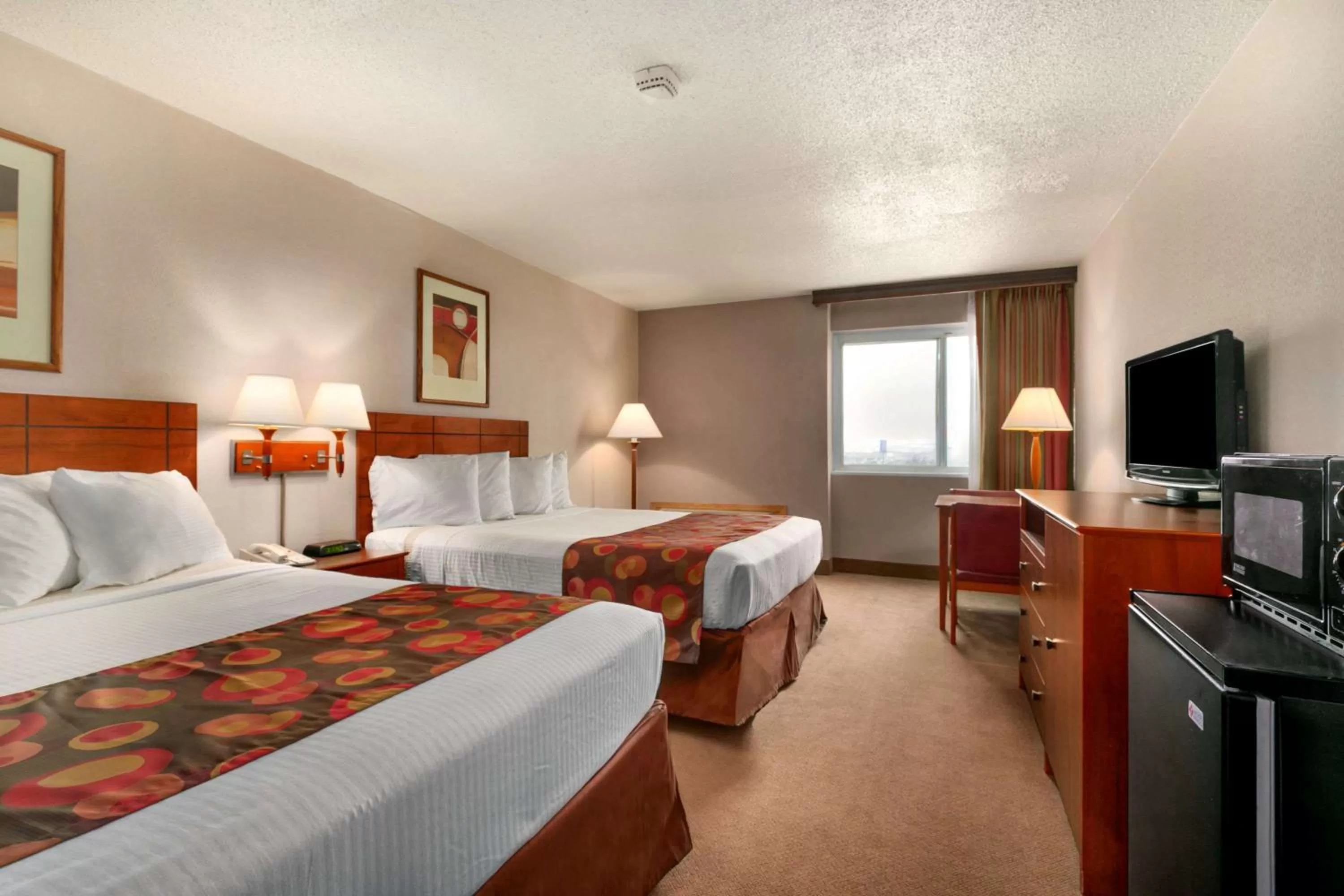 Photo of the whole room, Bed in Ramada by Wyndham Bismarck