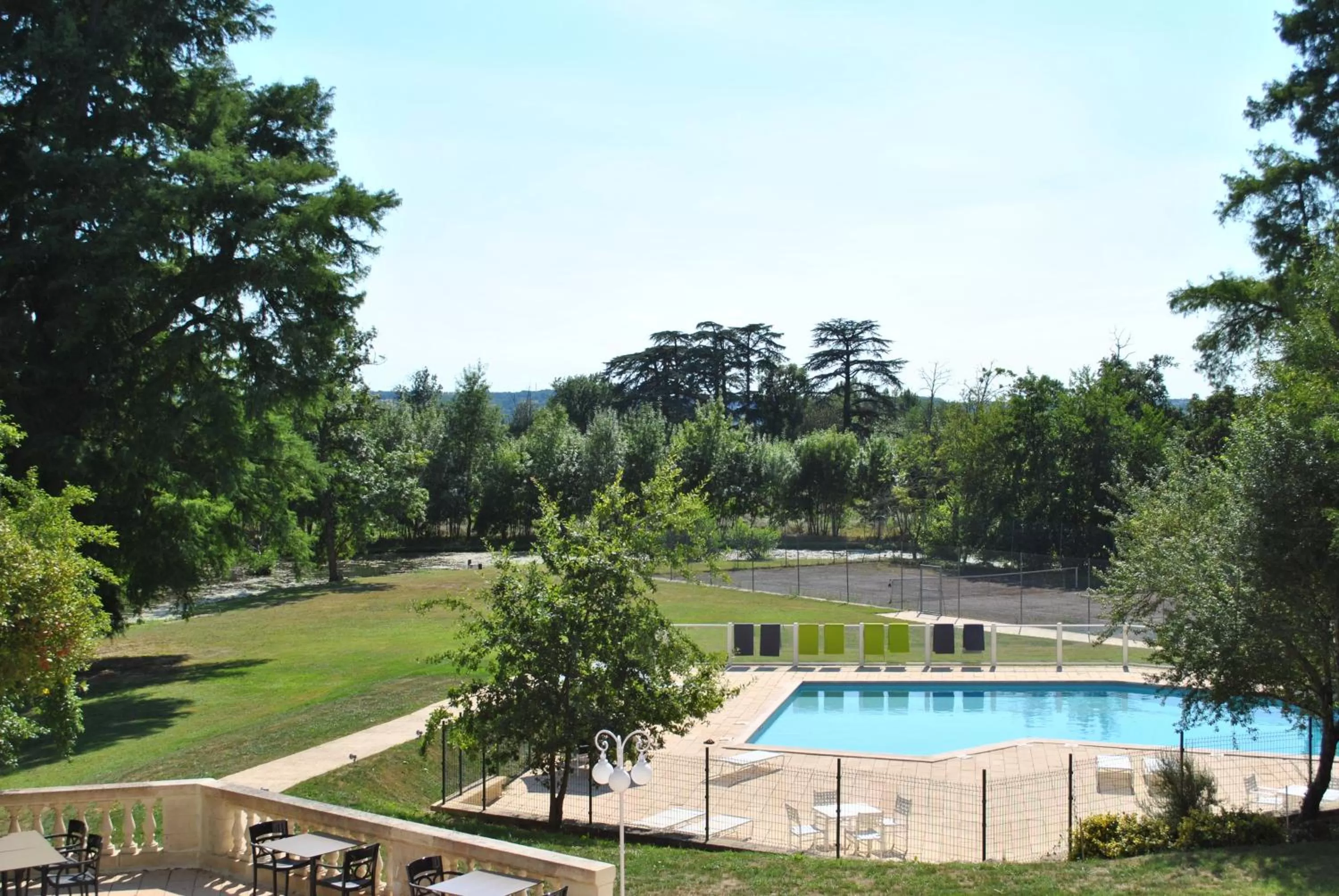 Swimming pool in Logis Hotels - Château Saint Marcel