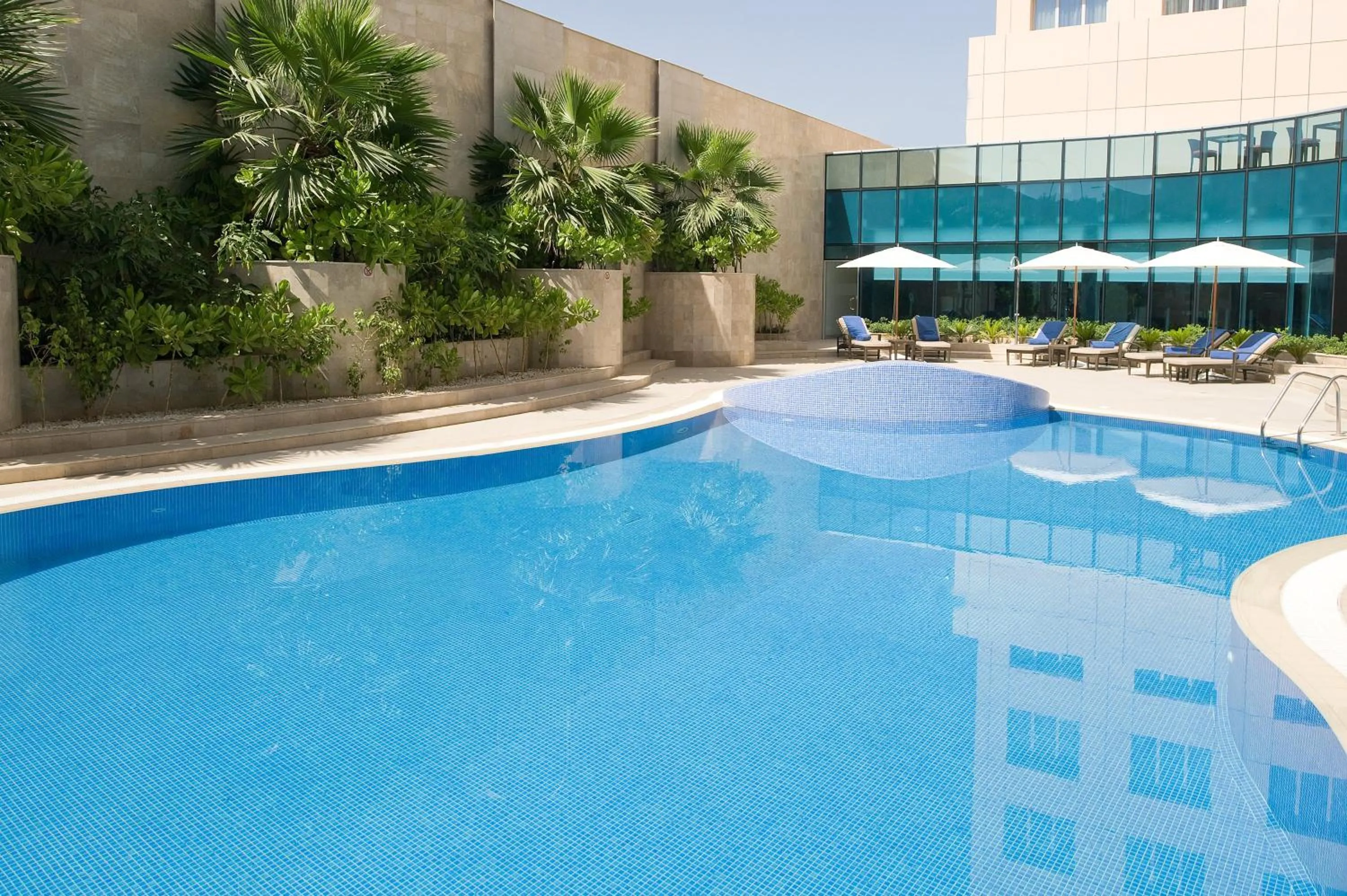 Swimming pool in Holiday Inn Muscat AlSeeb by IHG