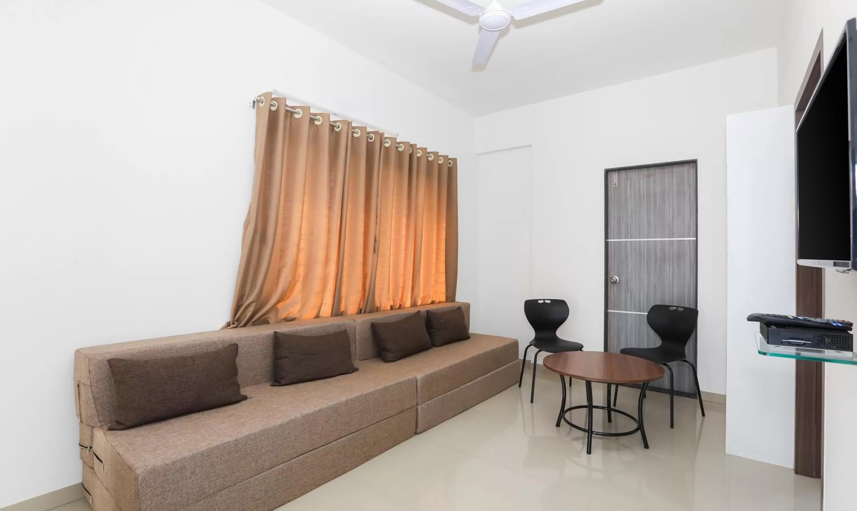 Seating area in Treebo Sapphire Studio