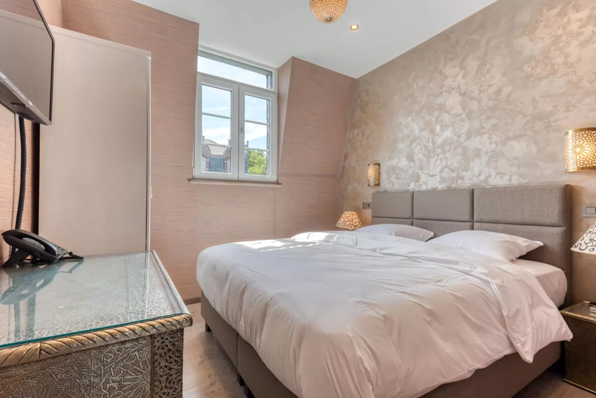 Bed in Ryad Mogador Liège