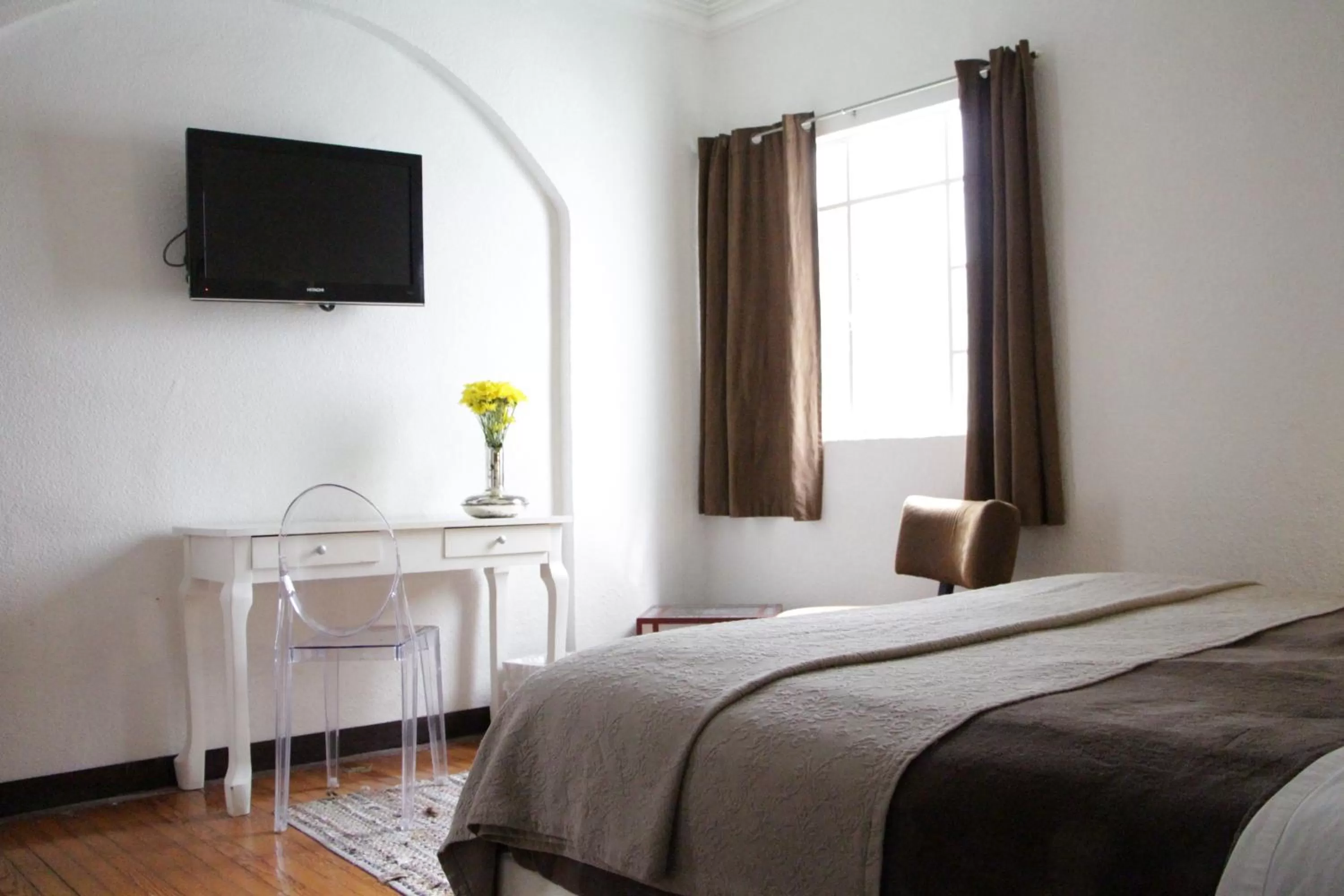 Photo of the whole room, TV/Entertainment Center in Distrito Condesa Rooms and Studios