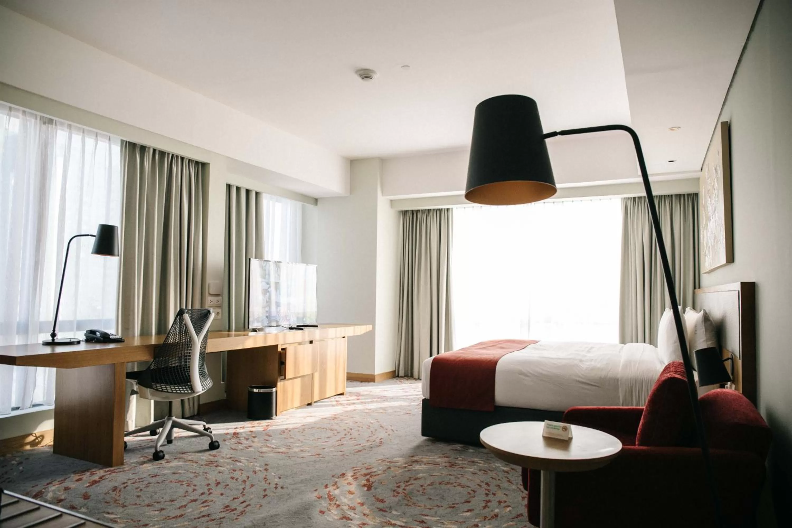 Photo of the whole room, Bed in Holiday Inn & Suites Jakarta Gajah Mada by IHG