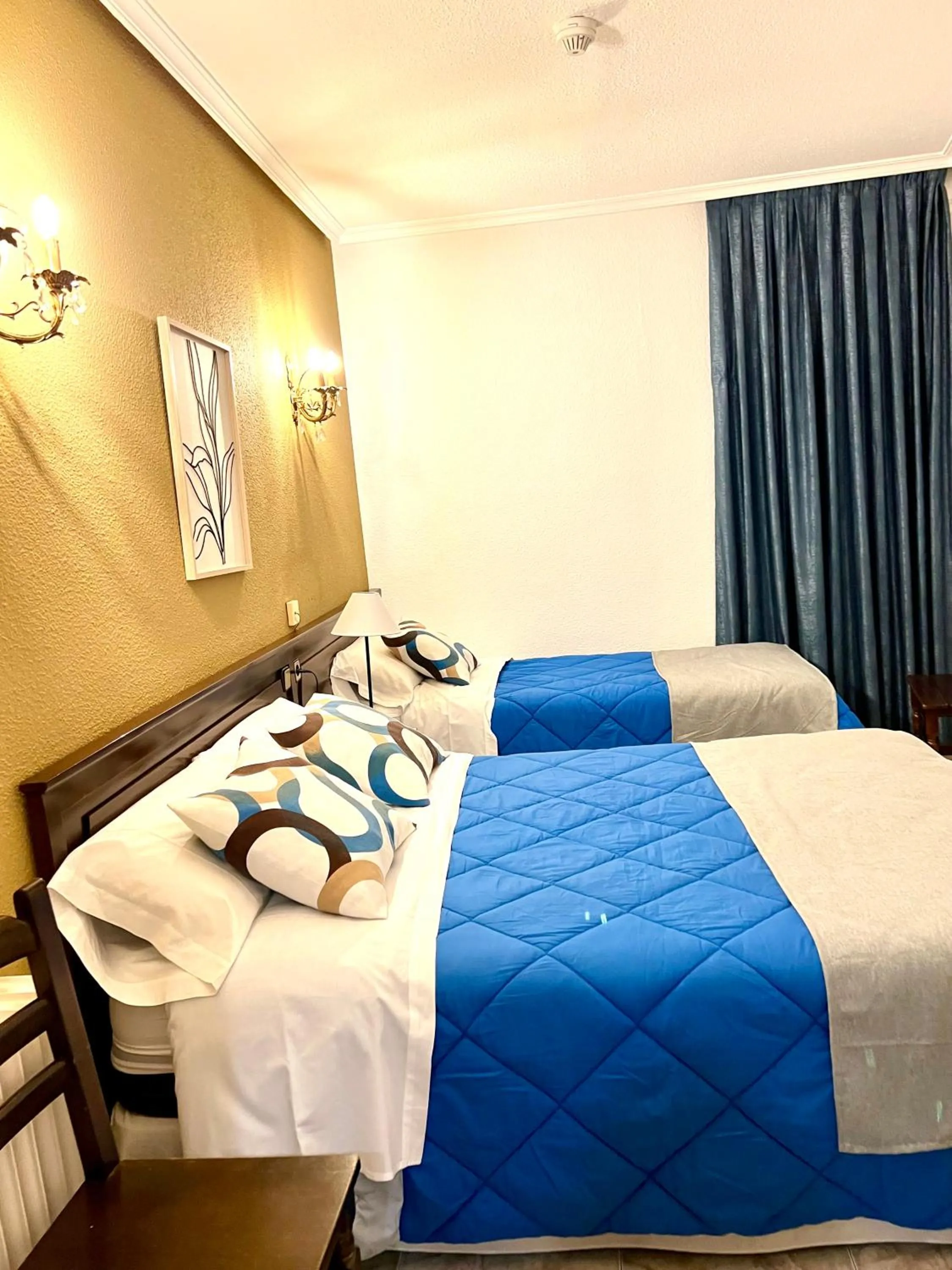 Photo of the whole room, Bed in Hostal Sonsoles Madrid-Centro