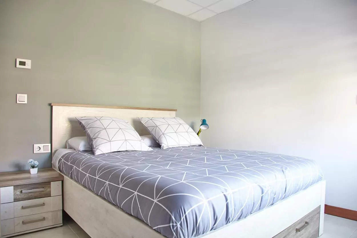 Bed in HOSTAL FONTAÑAN