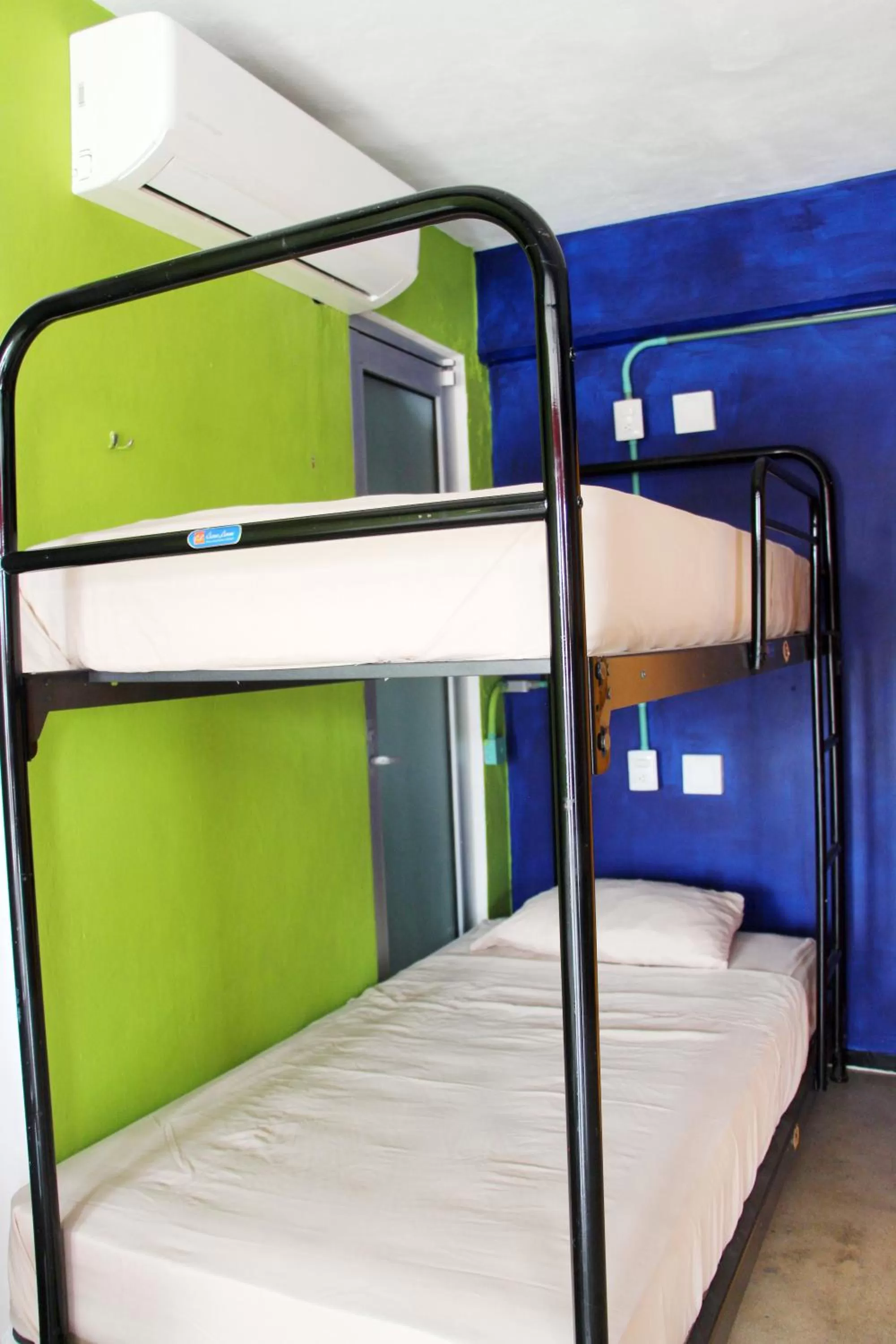 Photo of the whole room, Bunk Bed in Hotel & Hostal Casa de Luz Cancun