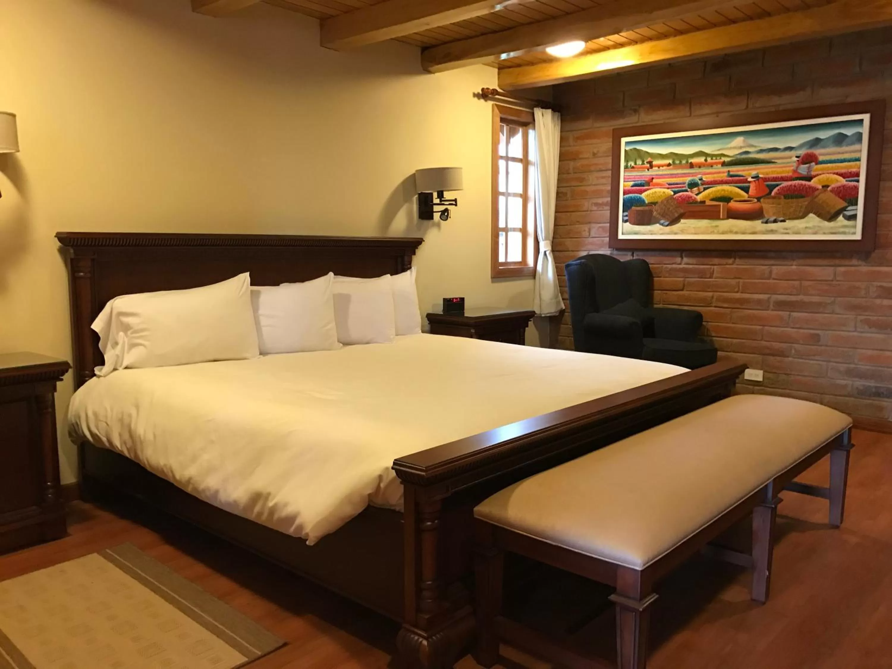 Bed in Puertolago Country Inn & Resort