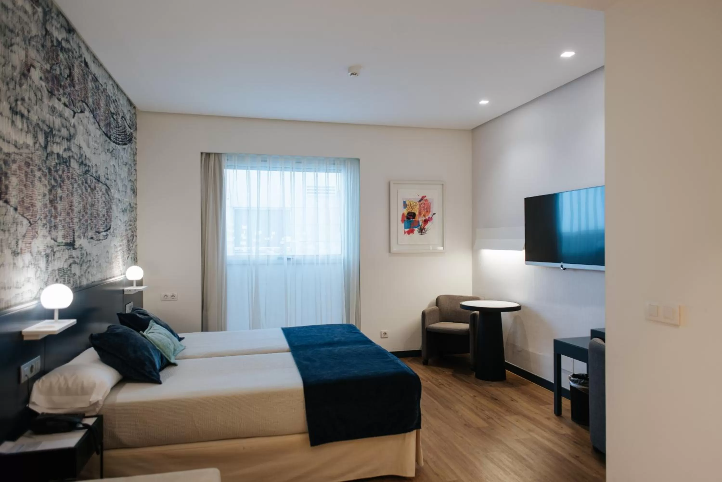 Bed in Hotel Neptuno Playa & Spa