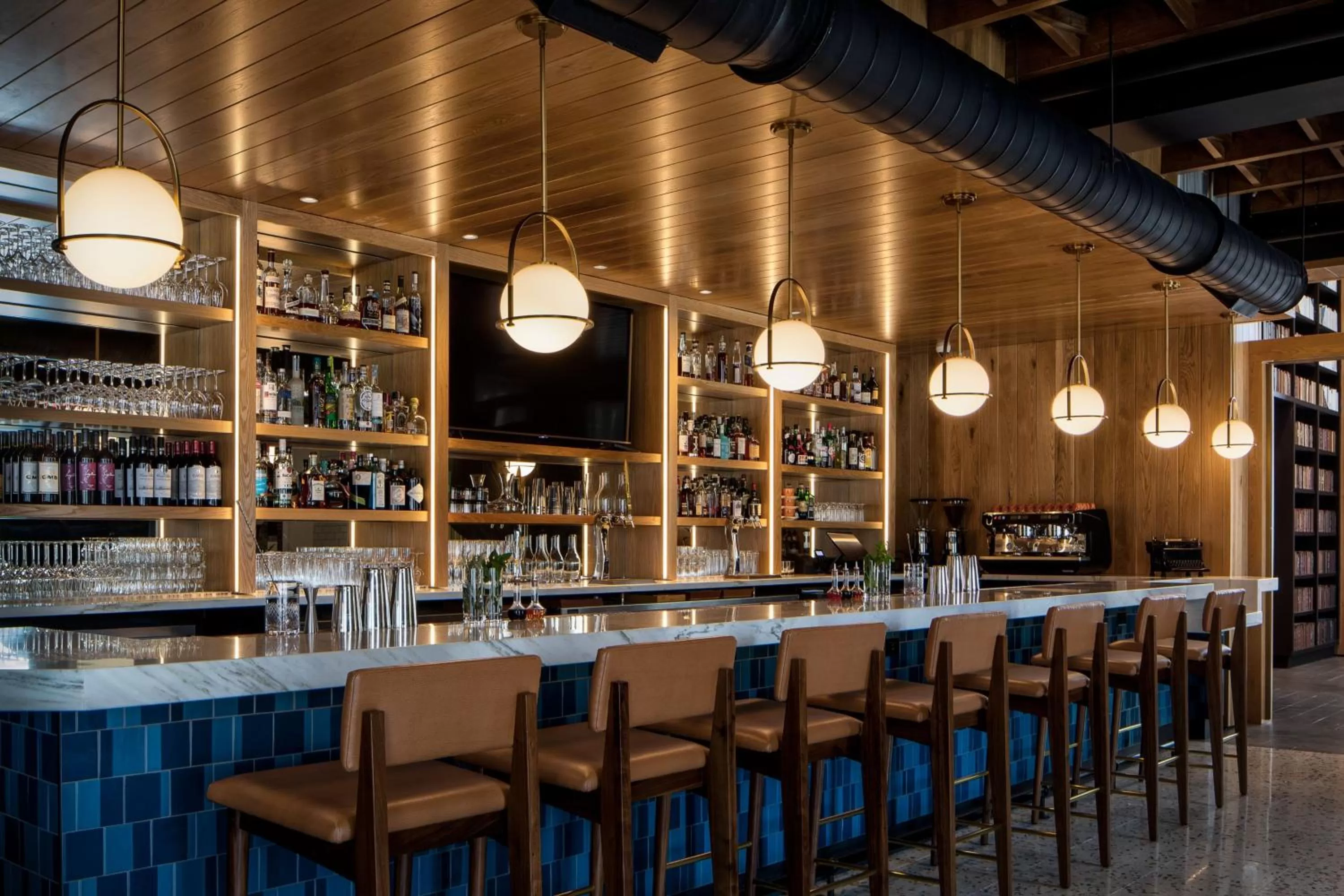 Lounge or bar in The Ellison, Oklahoma City, a Tribute Portfolio Hotel