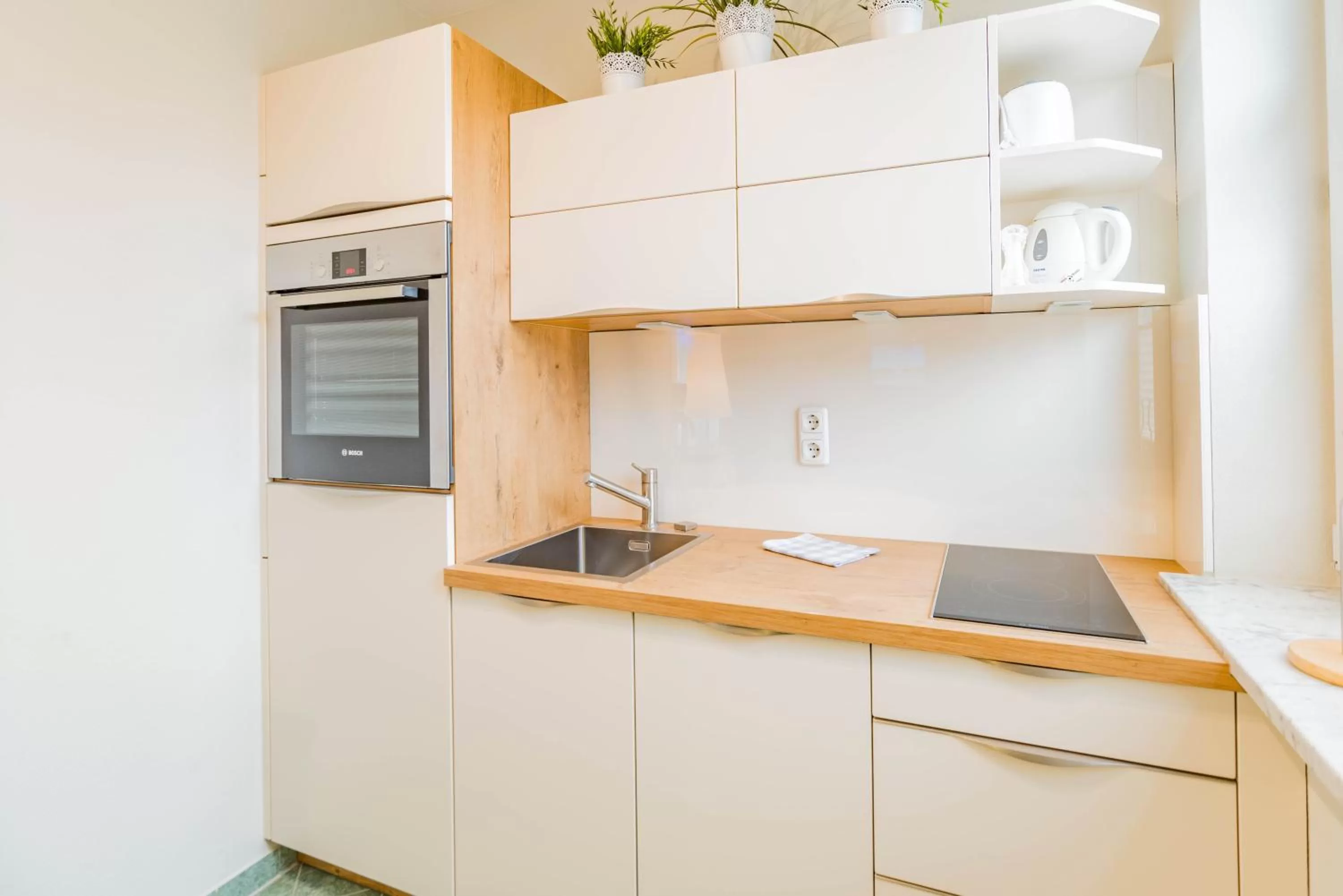 Photo of the whole room, Kitchen/Kitchenette in Am Weststrand Apartmenthaus Waldeck