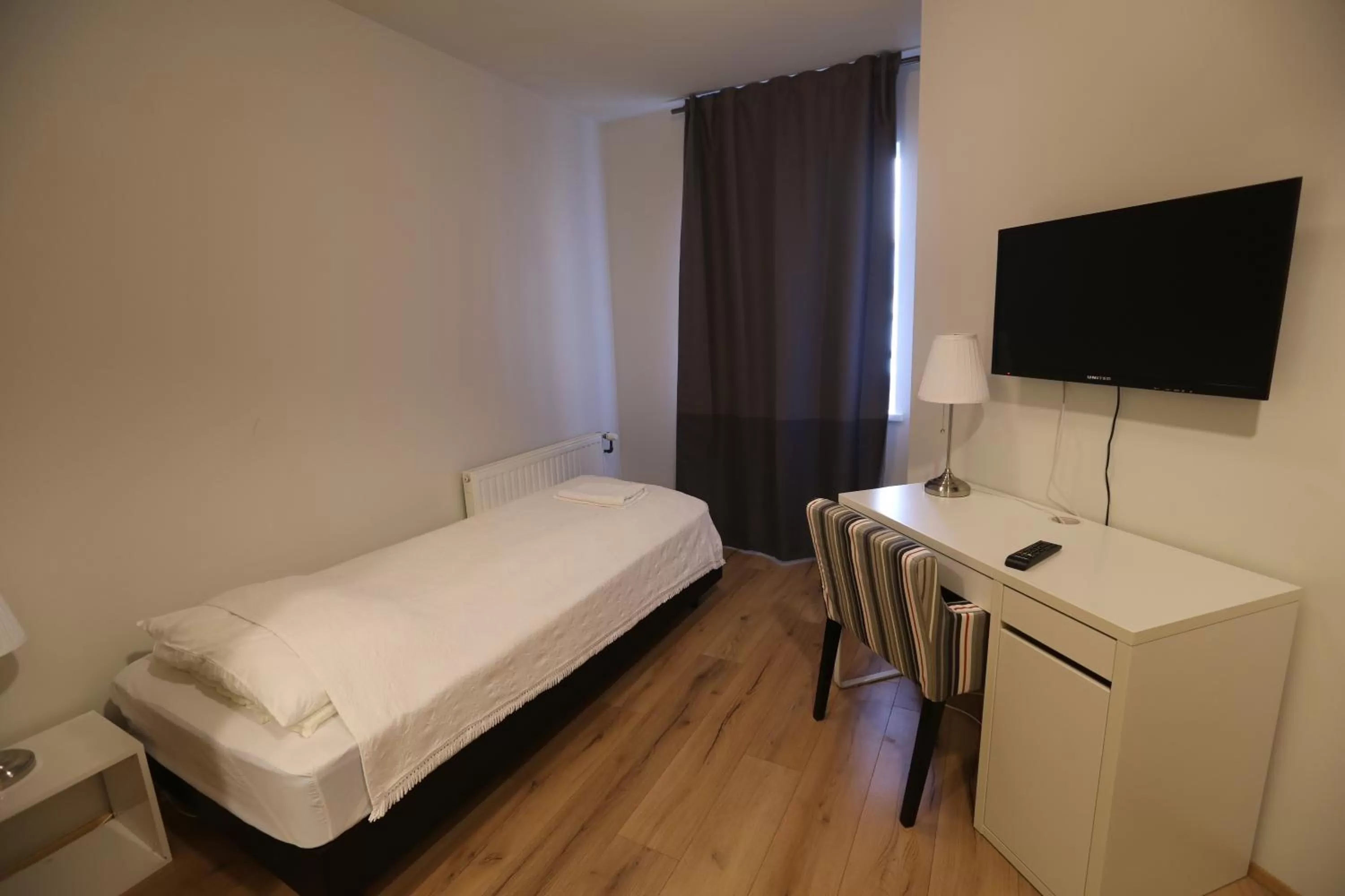 Bed in 100 Iceland Hotel