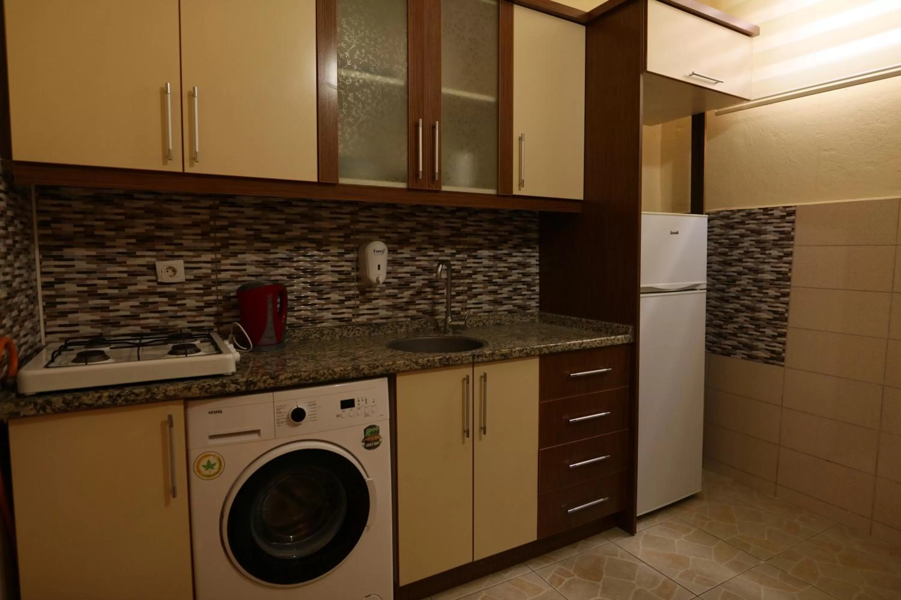 Kitchen or kitchenette in Epoch Stone House