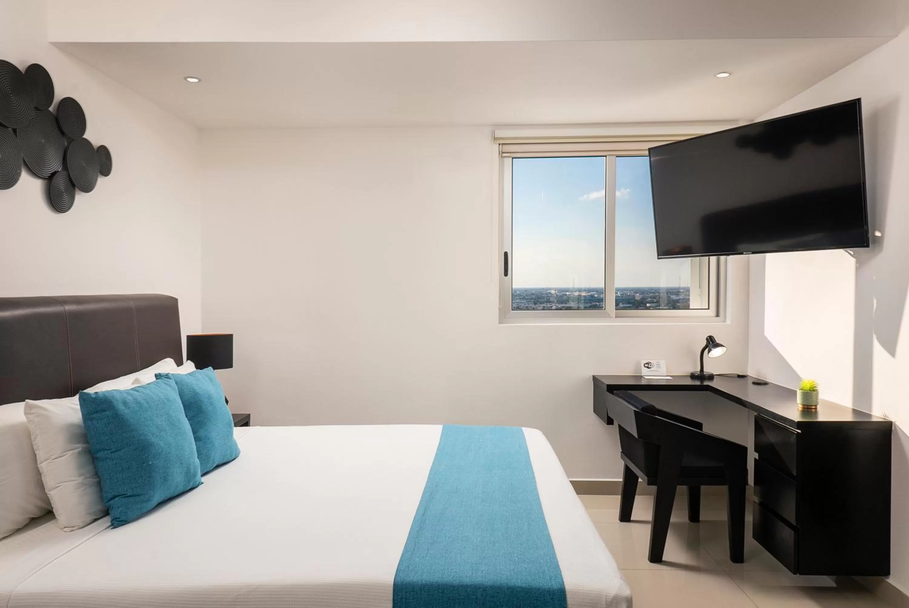 Bed in Suites Malecon Cancun