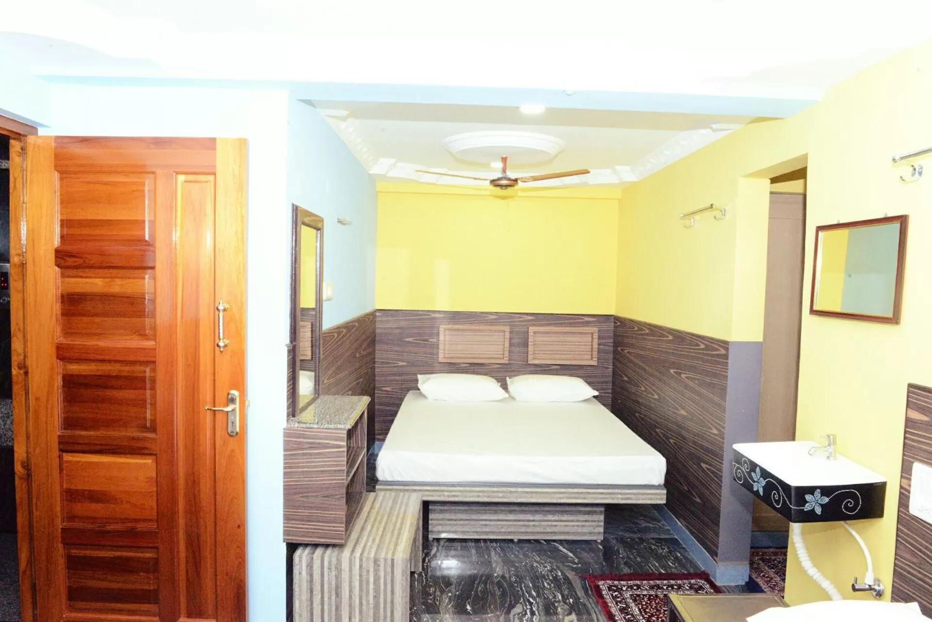 Bed in Vasanth Villa