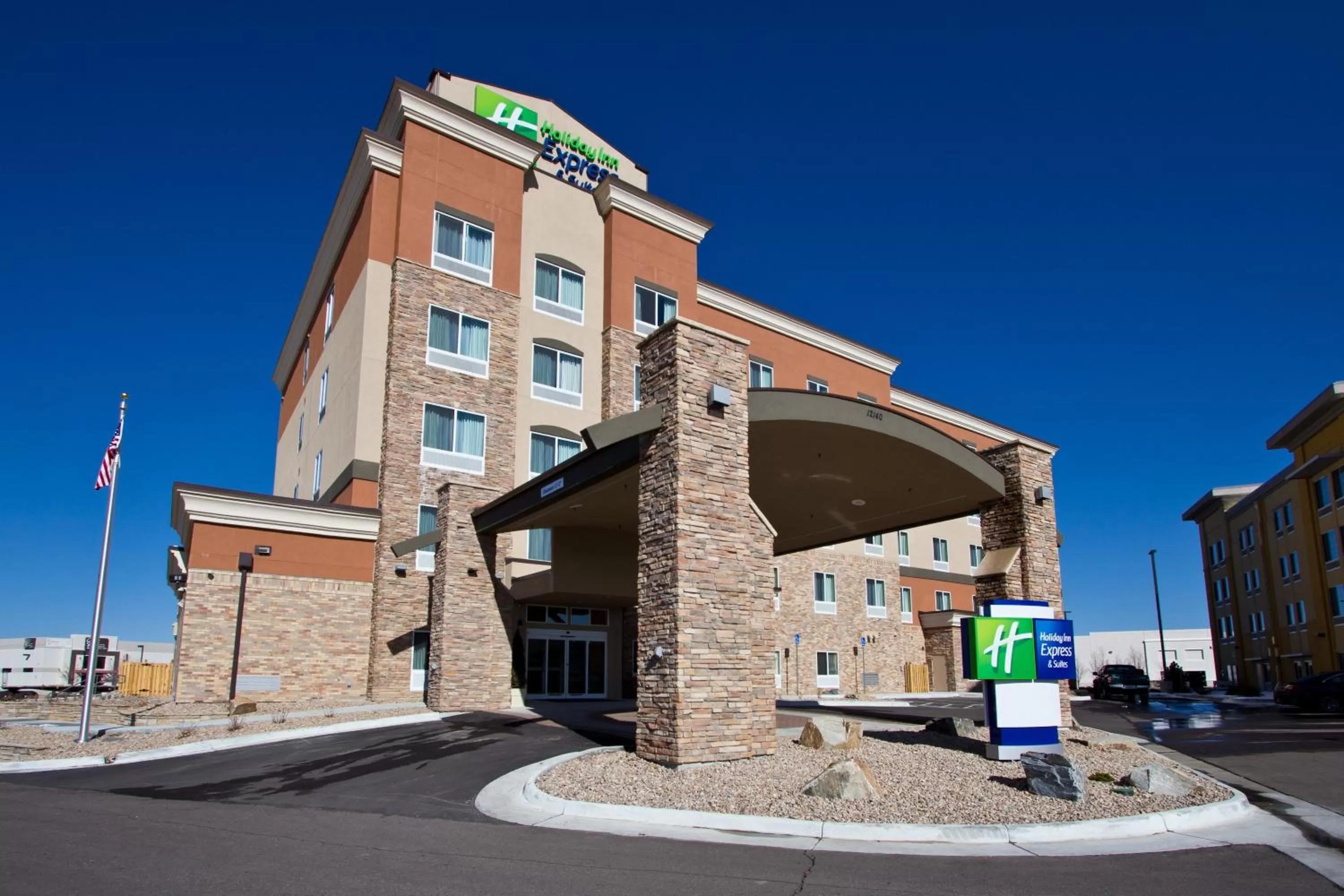 Property building in Holiday Inn Express and Suites Denver East Peoria Street by IHG