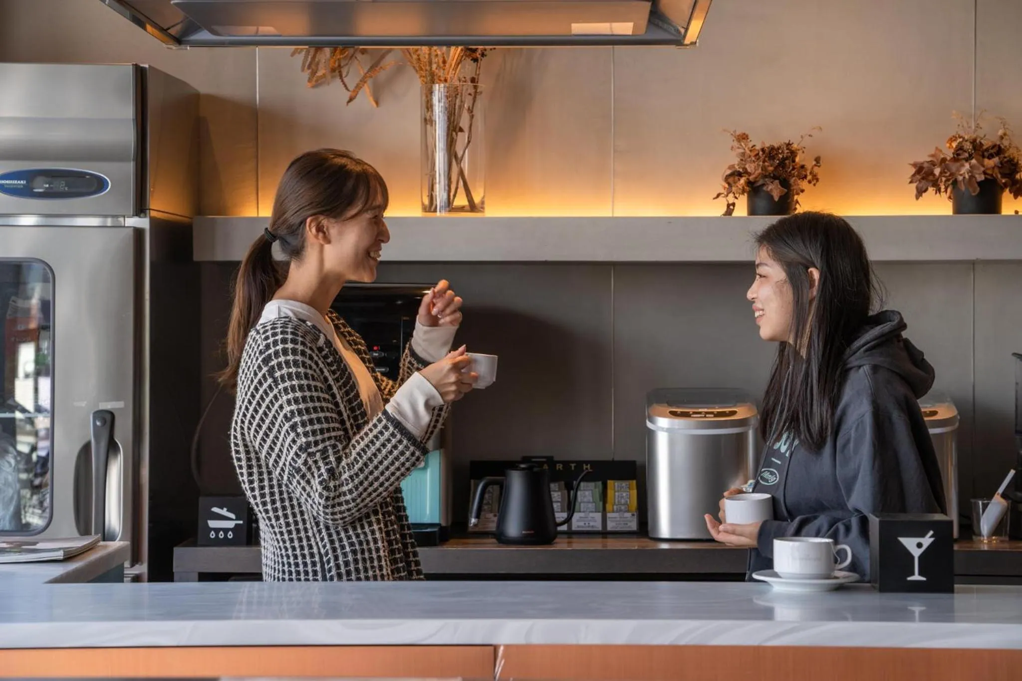 Communal kitchen in The Millennials Kyoto